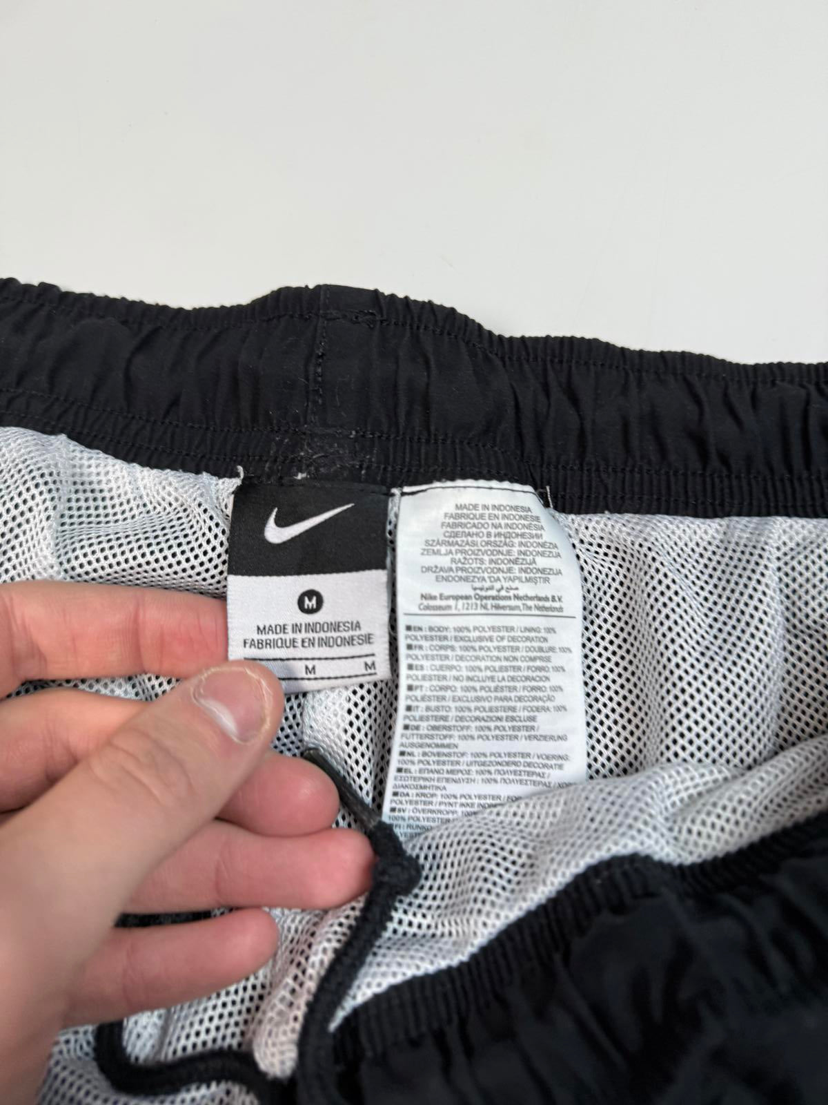 Vintage Nike side stripe baggy track pants (M)