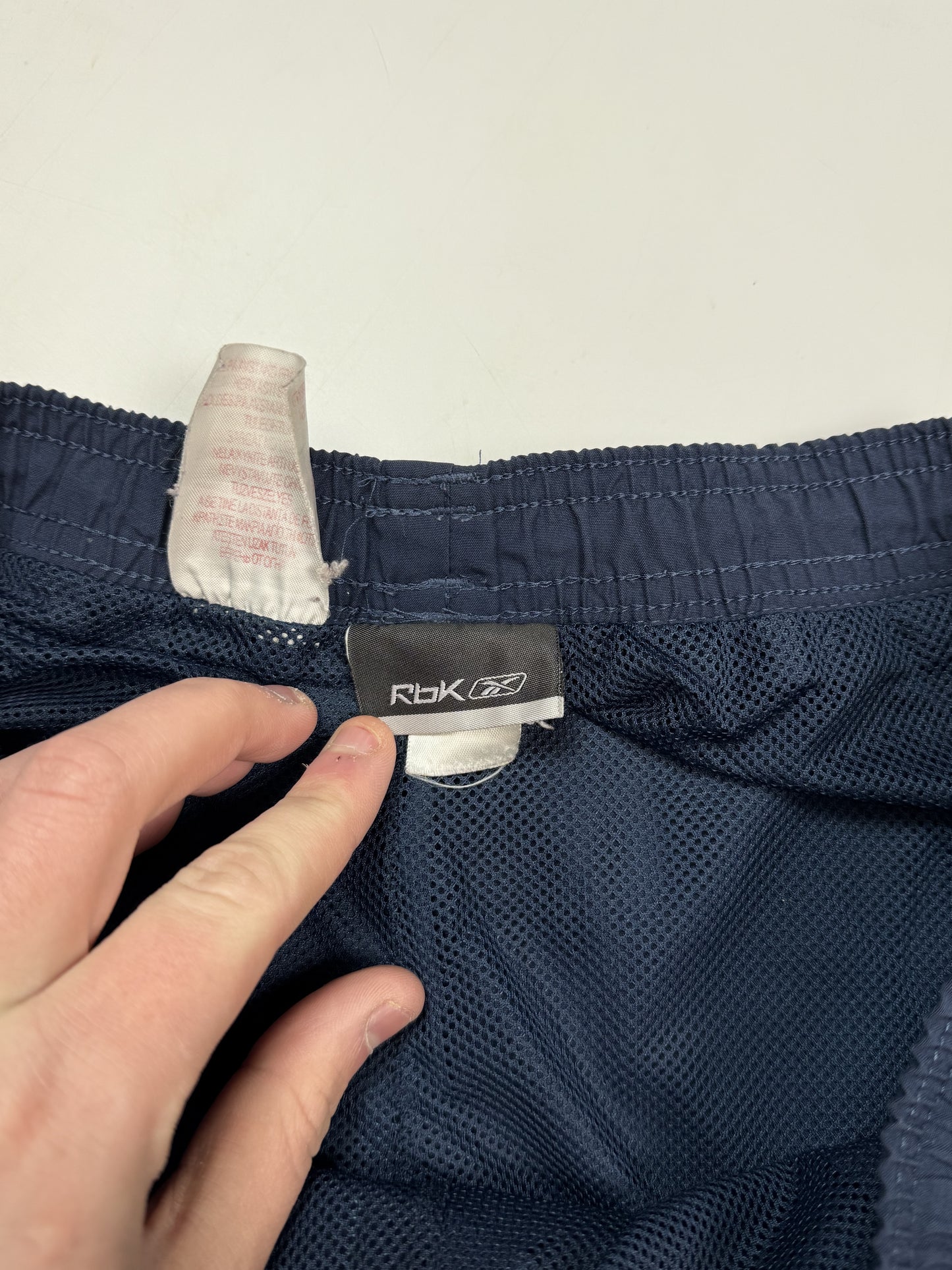 Vintage Reebok spell out track pants (S)