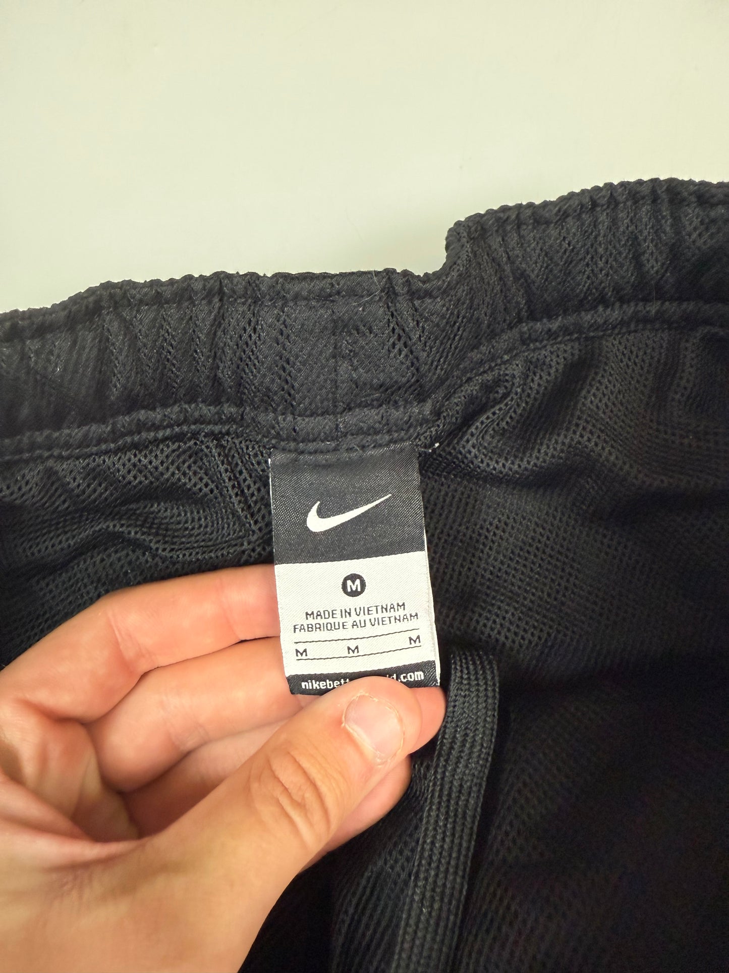 Vintage Nike spell out baggy track pants (M)