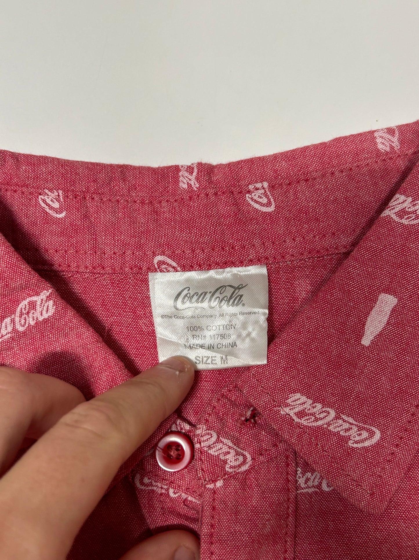 Coca cola all over print shirt (M)