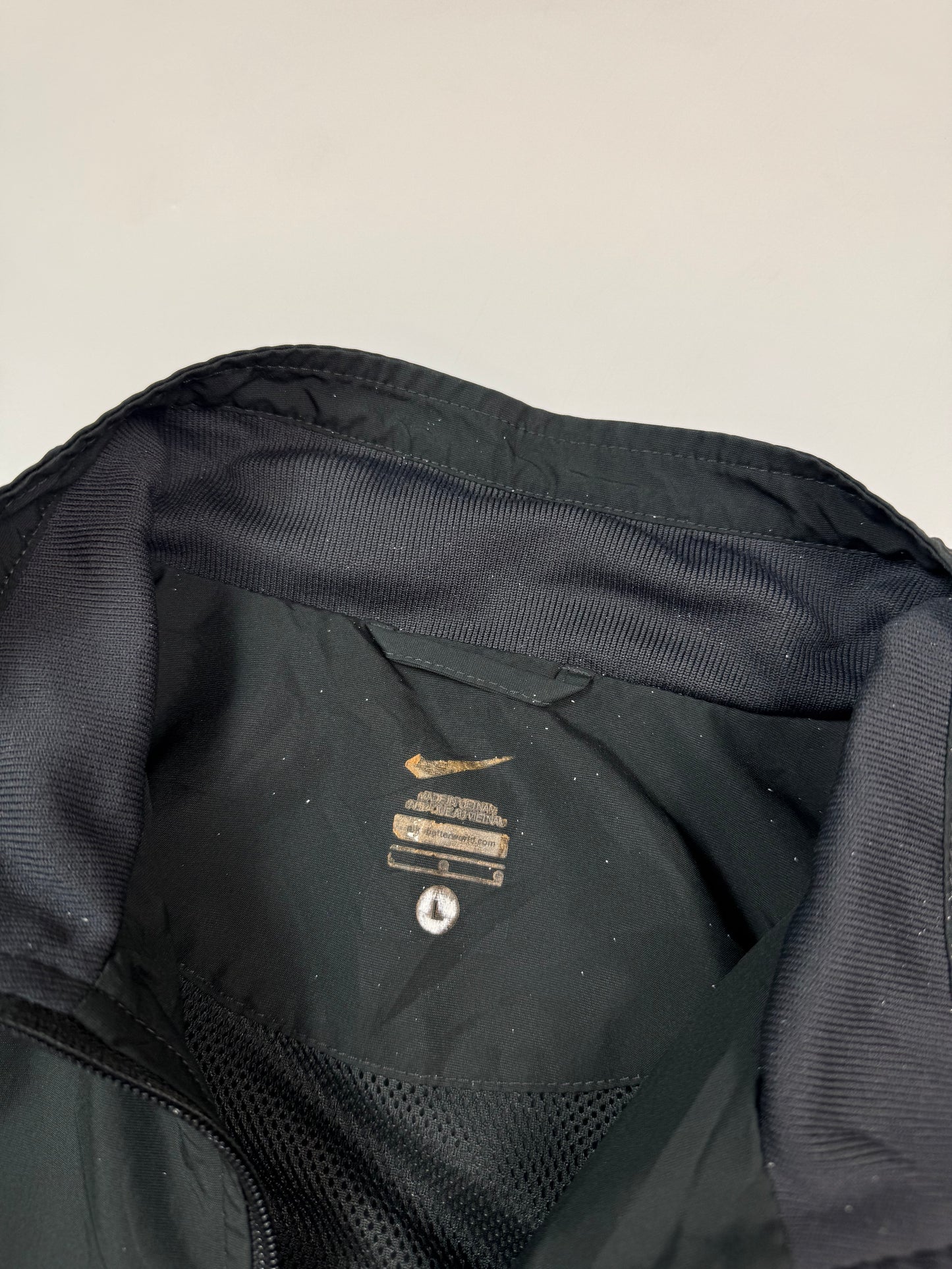Vintage Nike mini swoosh track jacket (L)