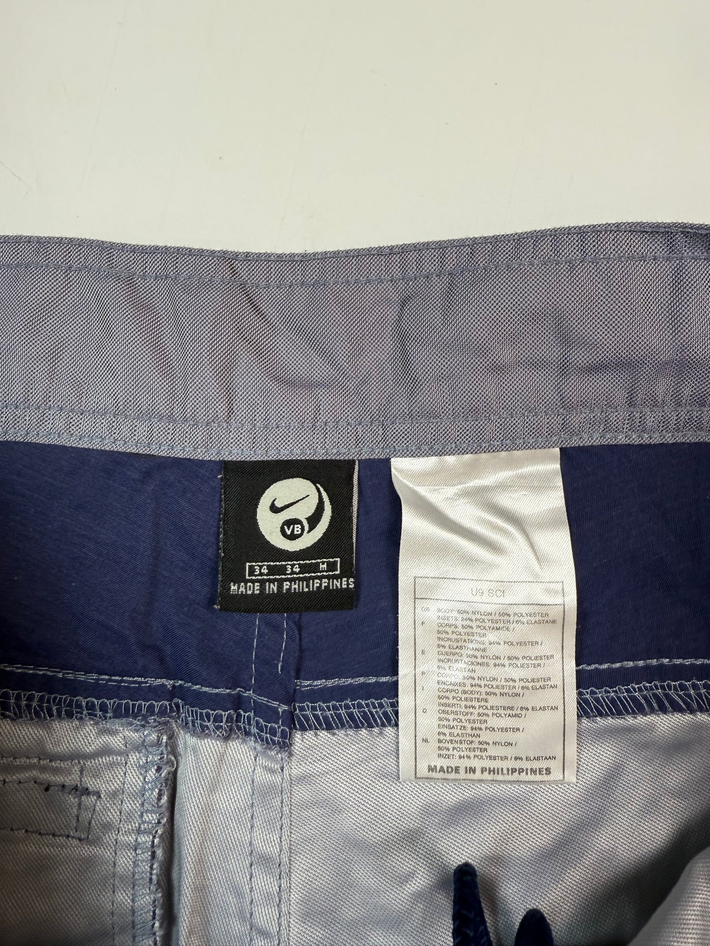 Vintage Nike volleyball baggy side stripe shorts (W34)