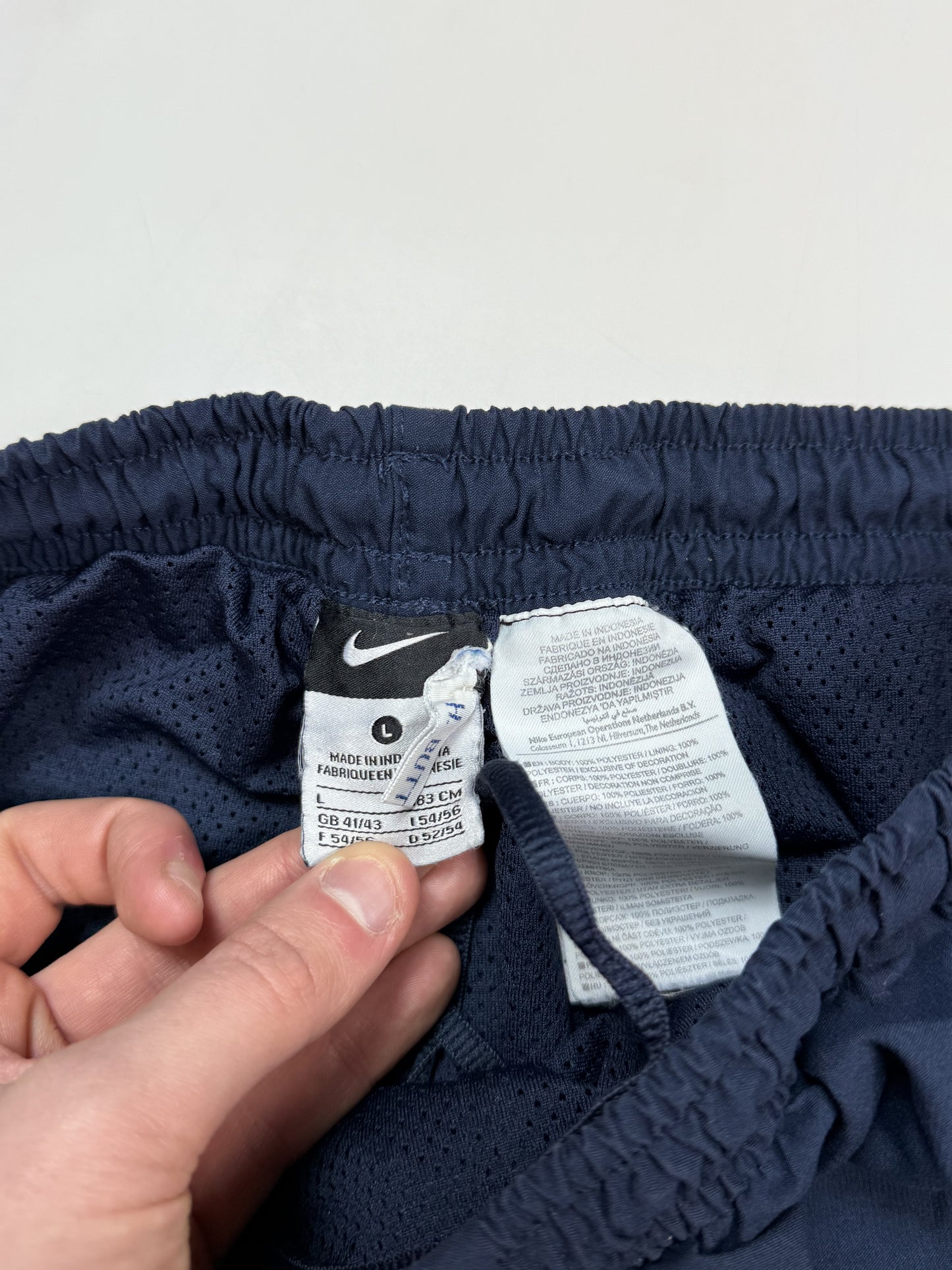 Vintage Nike mini swoosh baggy track pants (L)