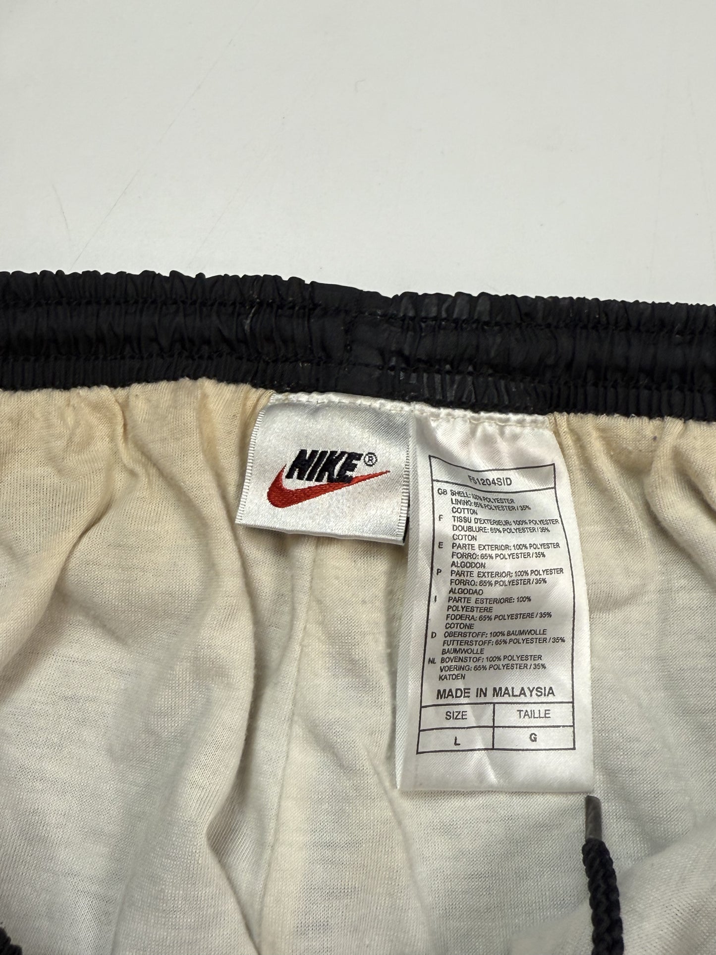 Vintage 90s Nike small logo track pants (L)