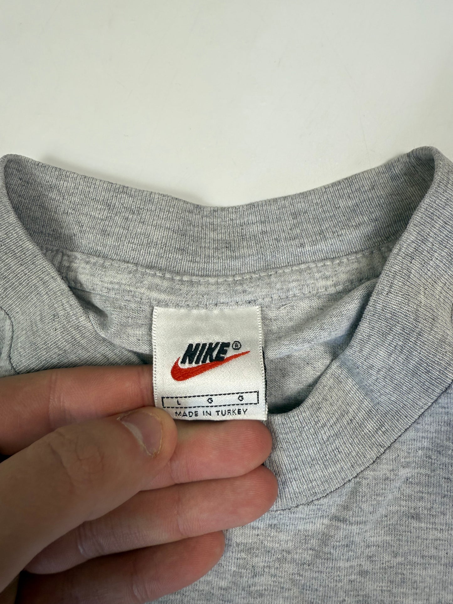 Vintage 90s Nike small logo tee (L)