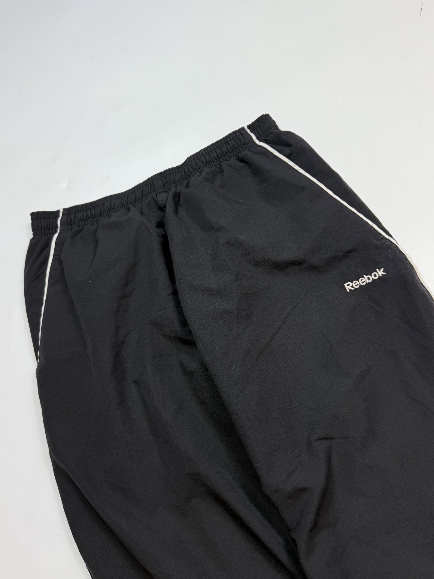Vintage Reebok spell out track pants (M)