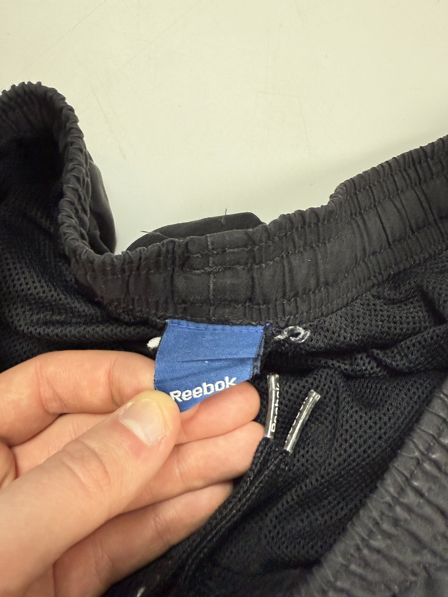 Vintage Reebok spell out track pants (M)