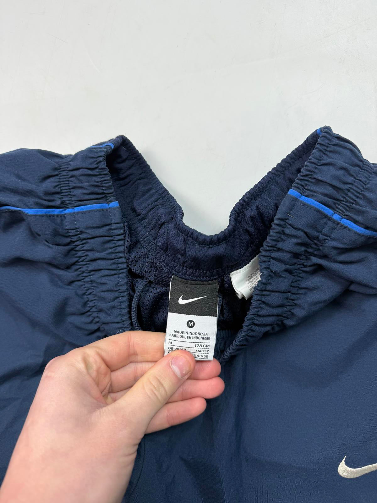 Vintage Nike side stripe baggy track pants (M)