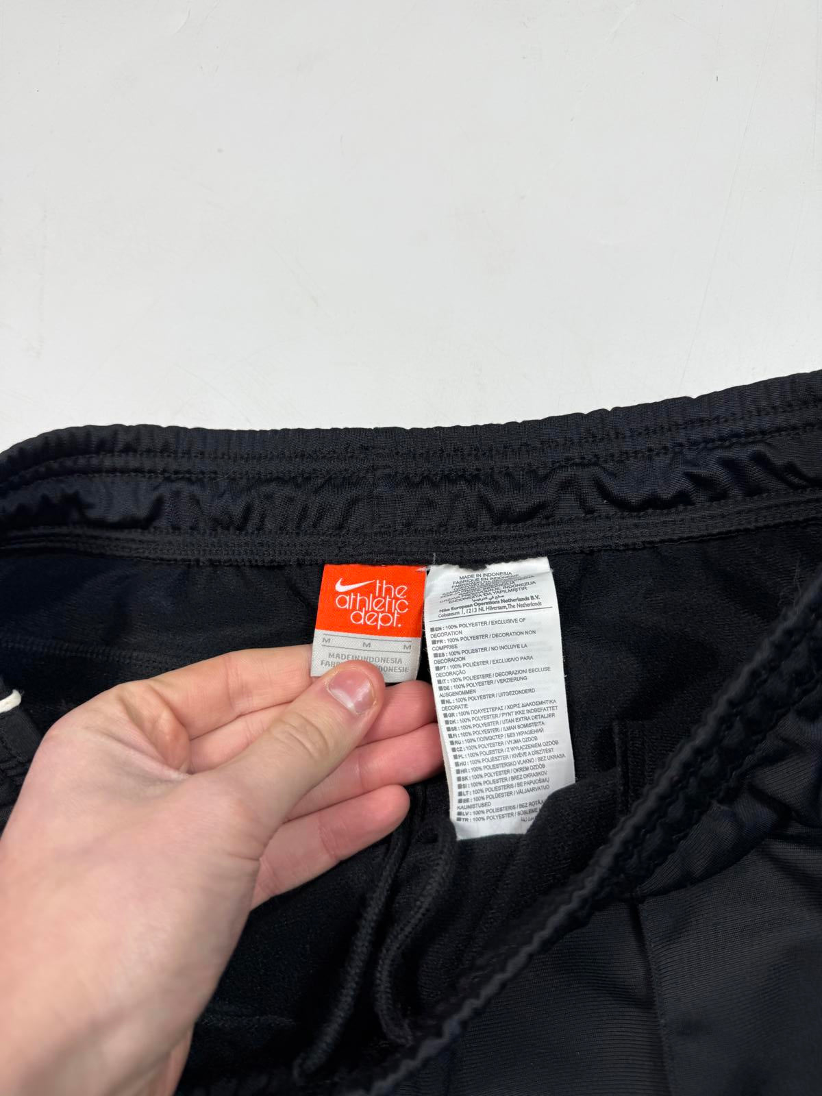 Vintage Nike mini swoosh baggy track pants (M)