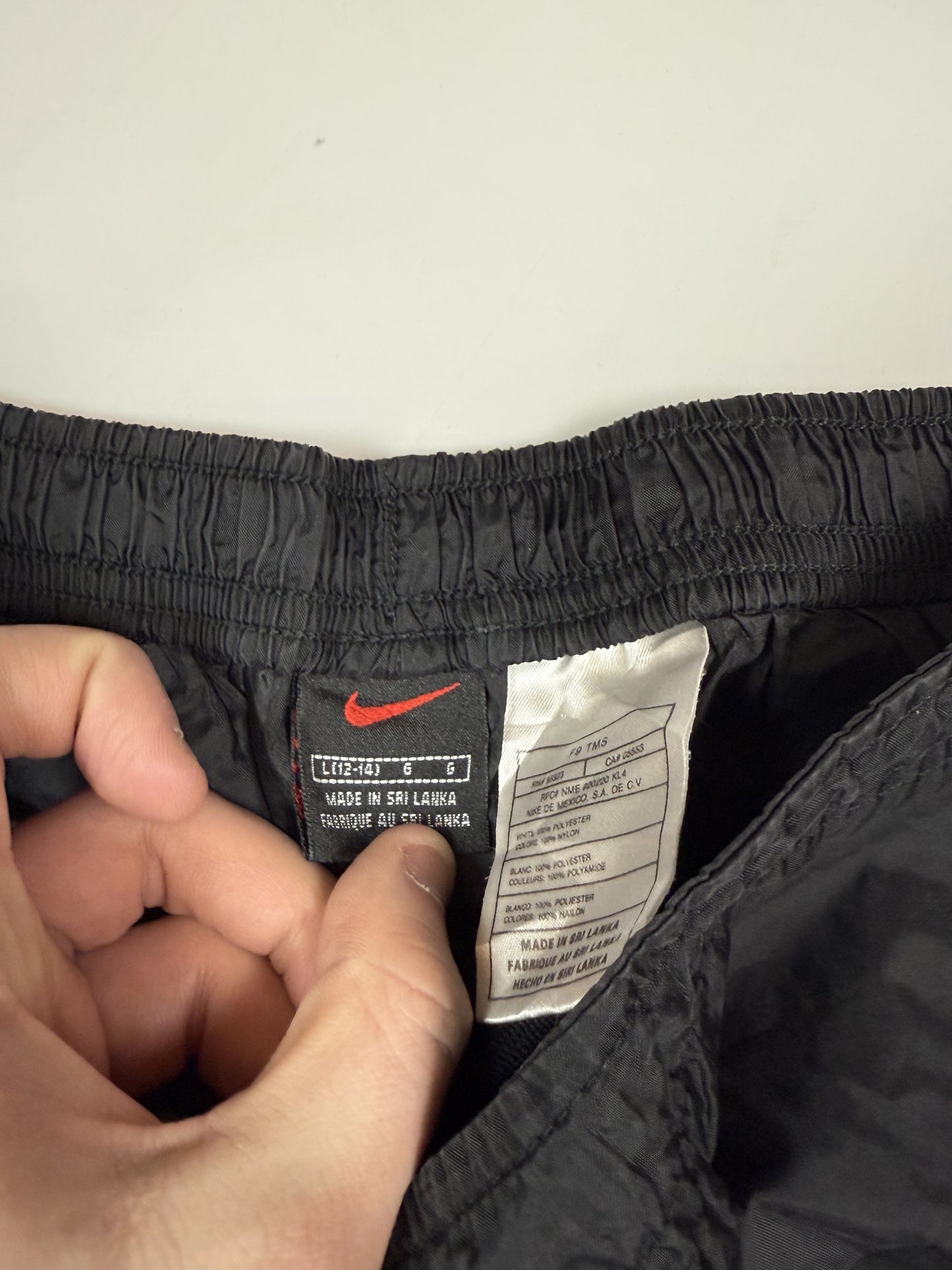 Vintage 90s Nike baggy track pants (M)