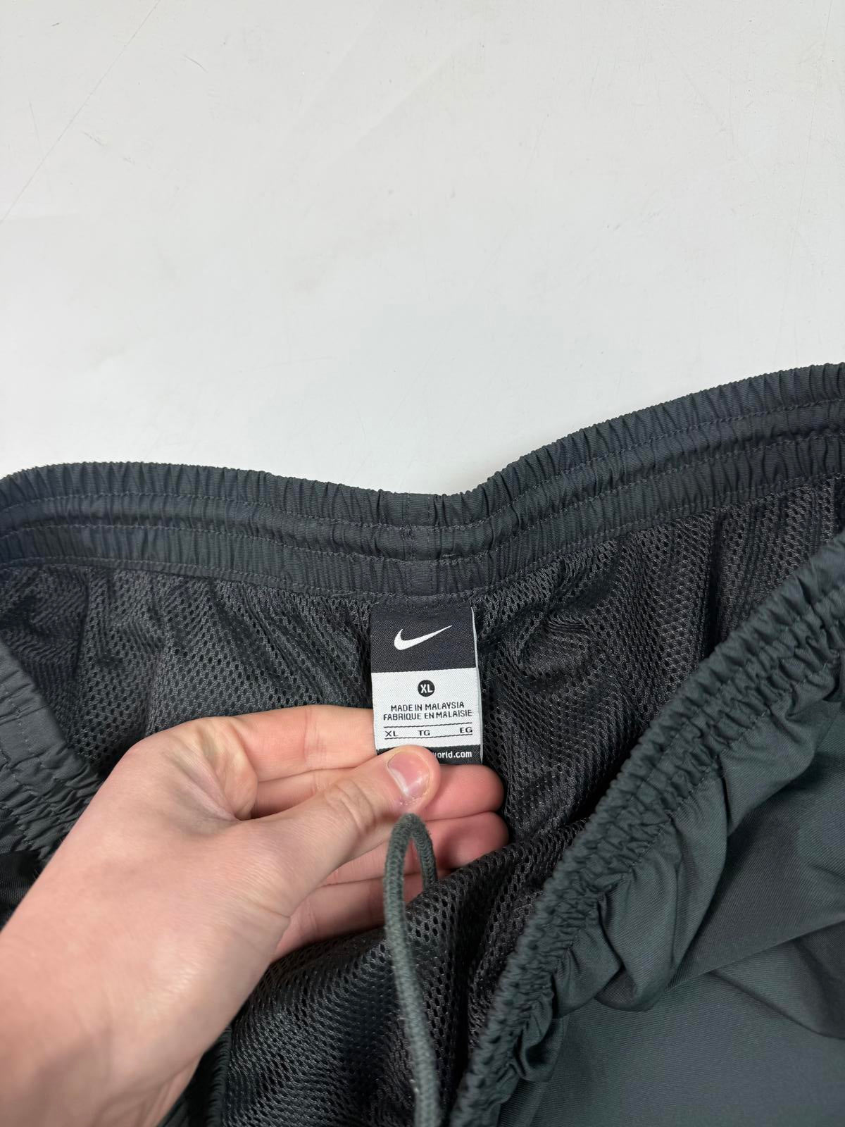 Vintage Nike mini swoosh baggy track pants (XL)