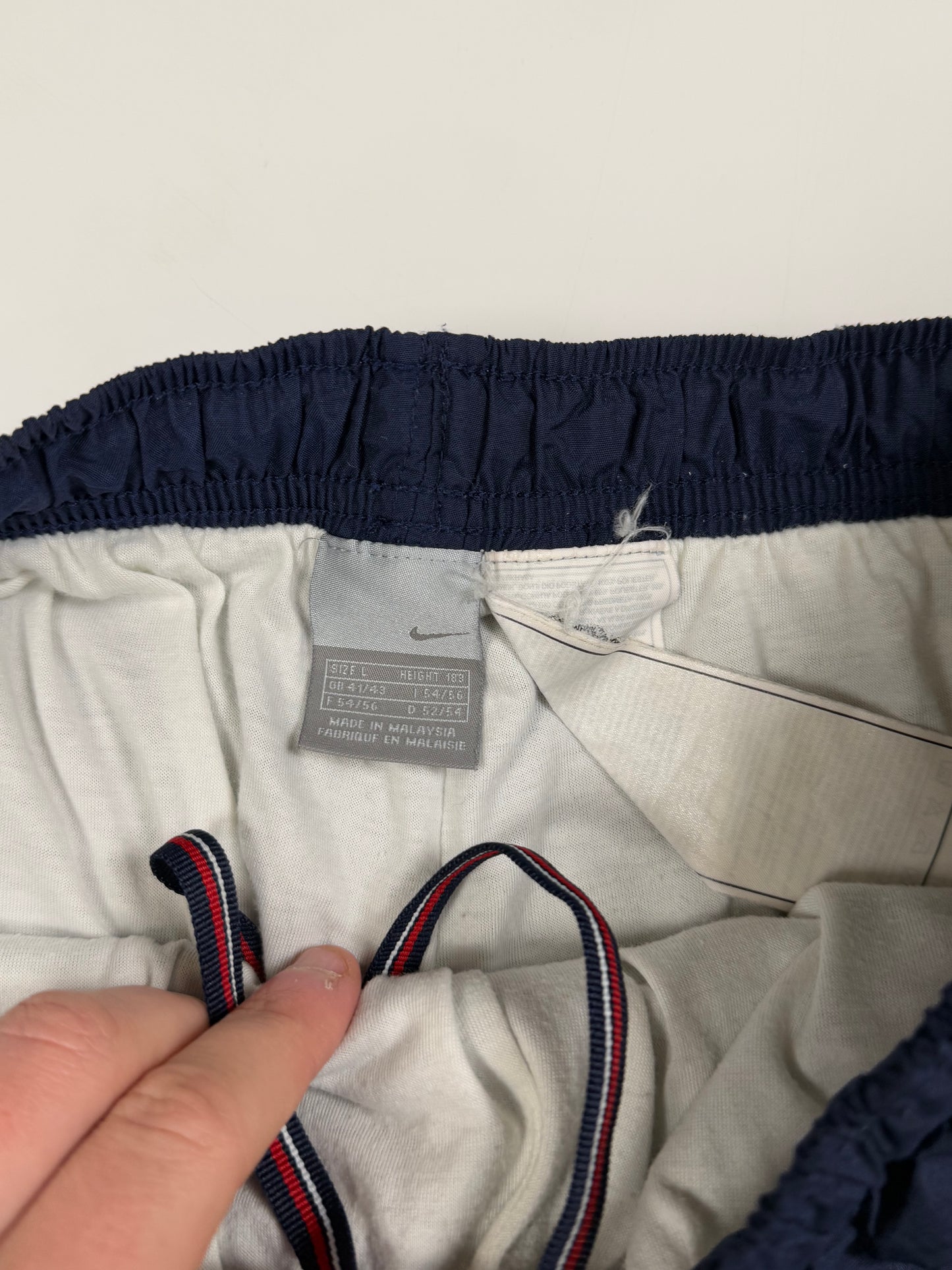Vintage Nike mini swoosh baggy track pants (L)