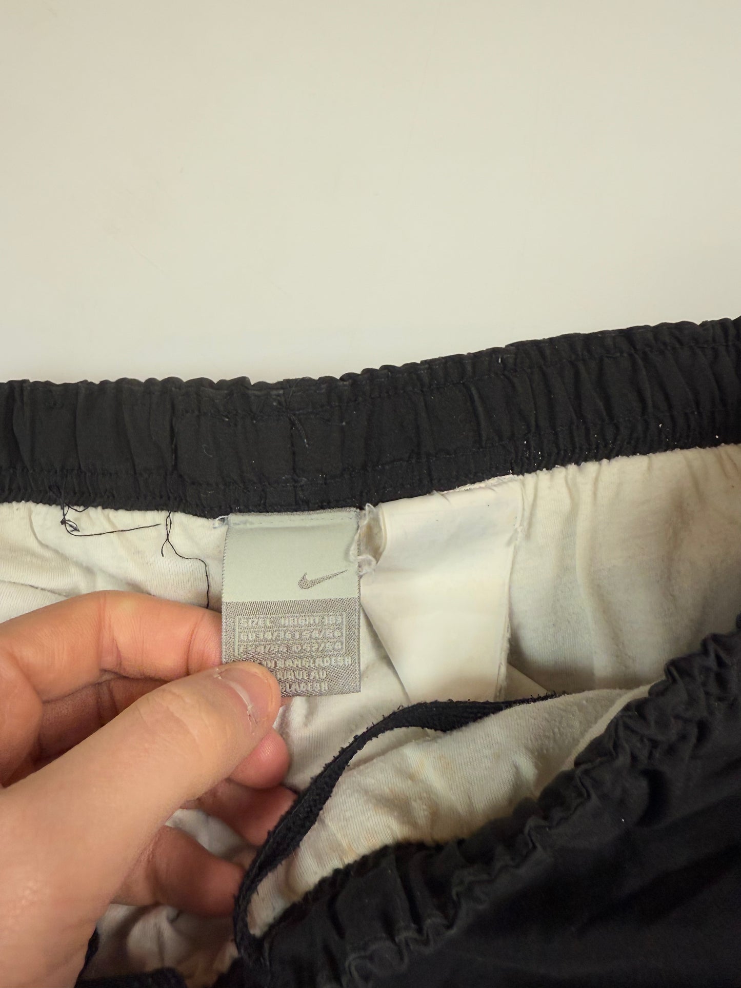 Vintage Nike mini swoosh baggy track pants (L)