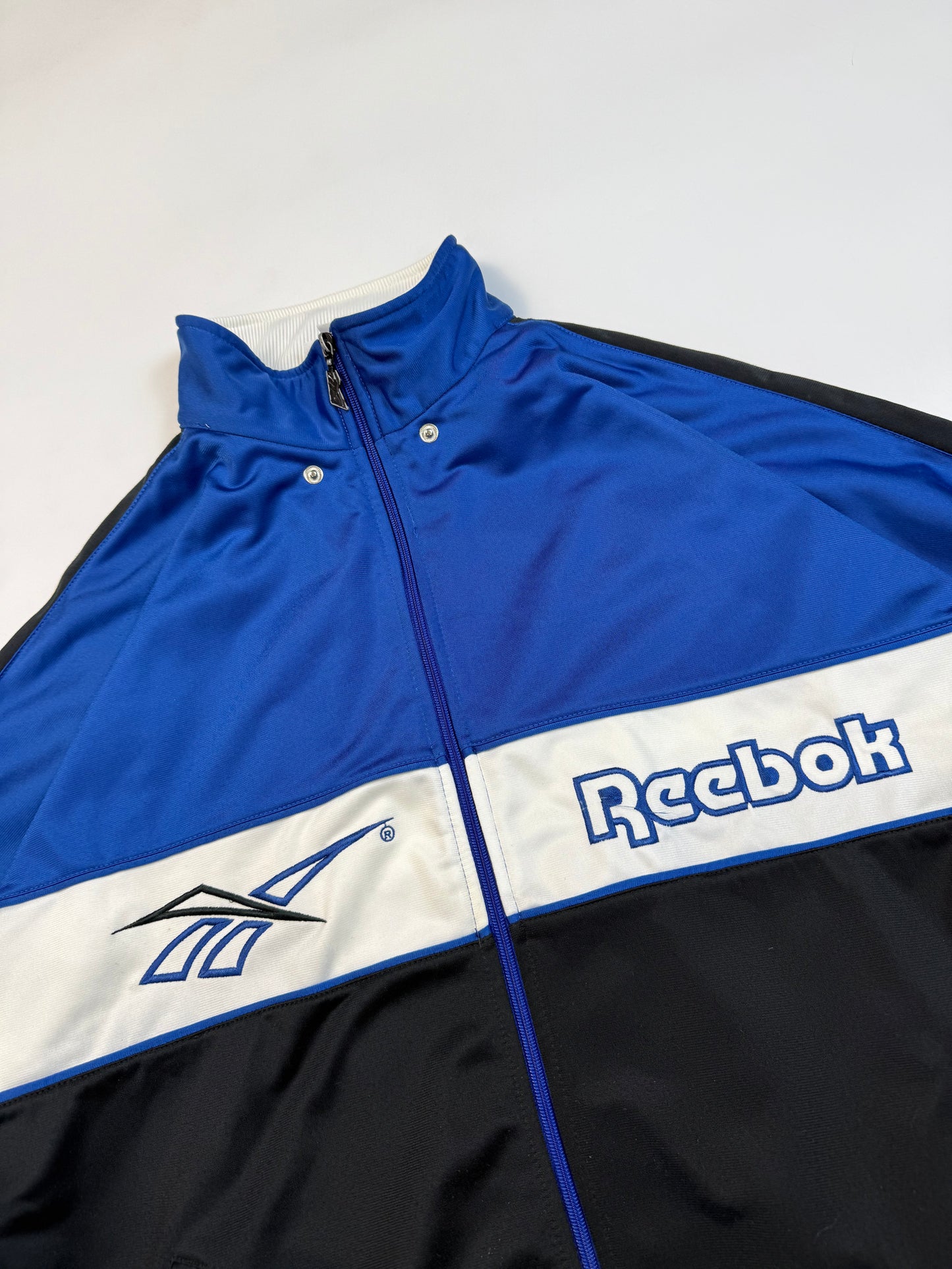 Vintage 90s Reebok spell out track jacket (L)