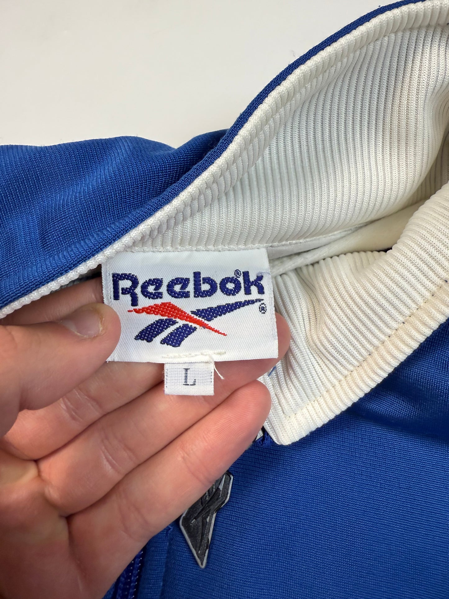 Vintage 90s Reebok spell out track jacket (L)