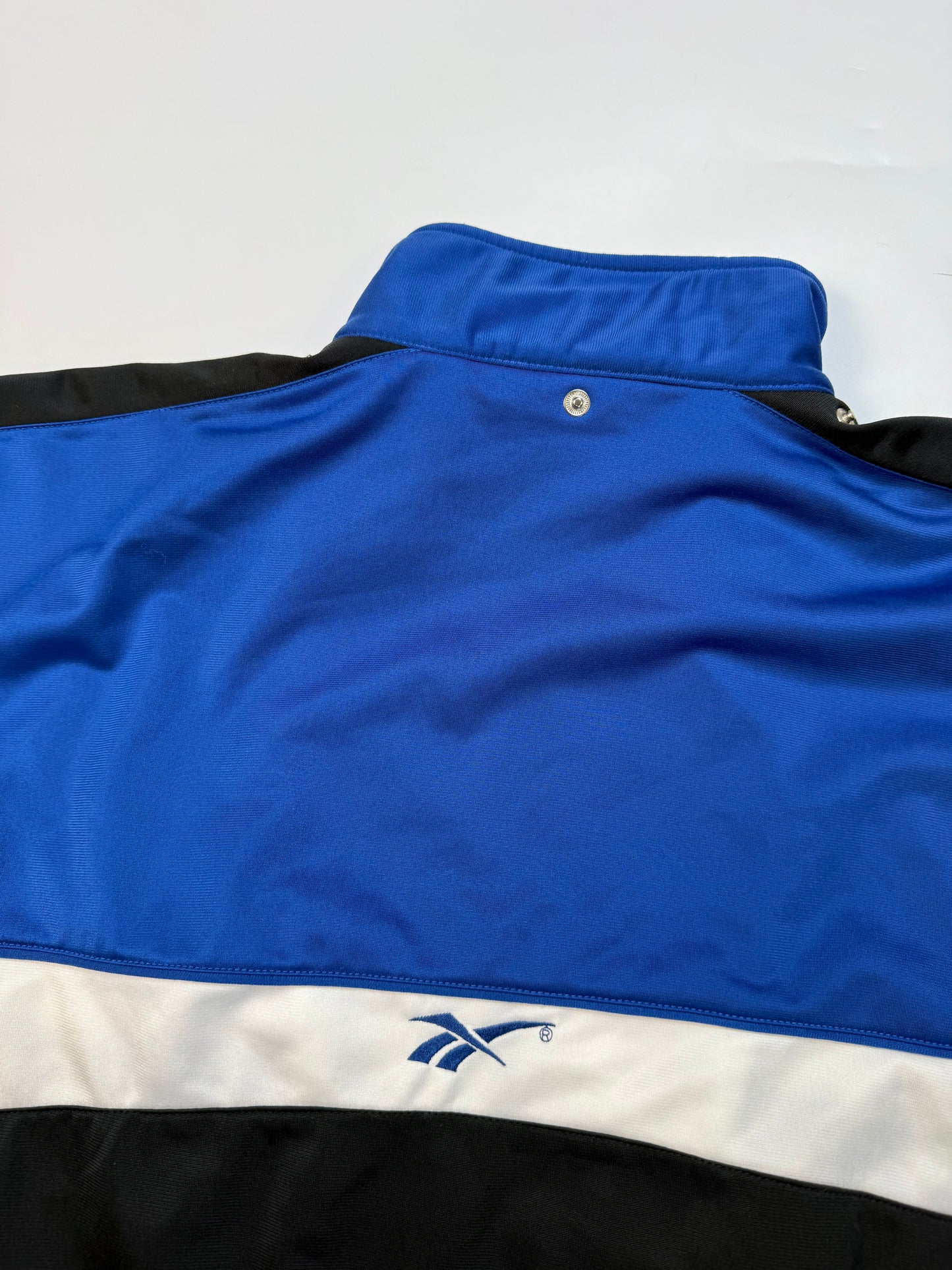 Vintage 90s Reebok spell out track jacket (L)