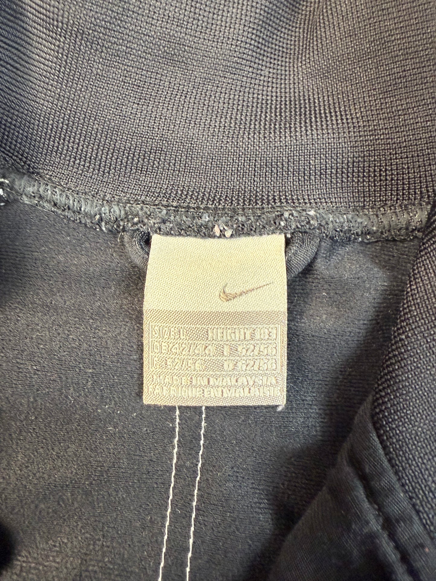 Vintage Nike striped track jacket (L)
