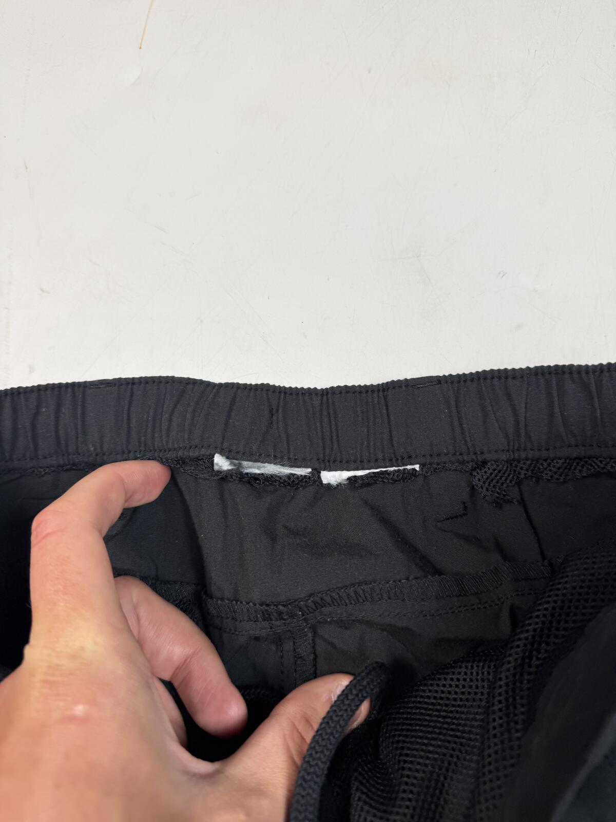 Vintage Nike mini swoosh baggy track pants (L)