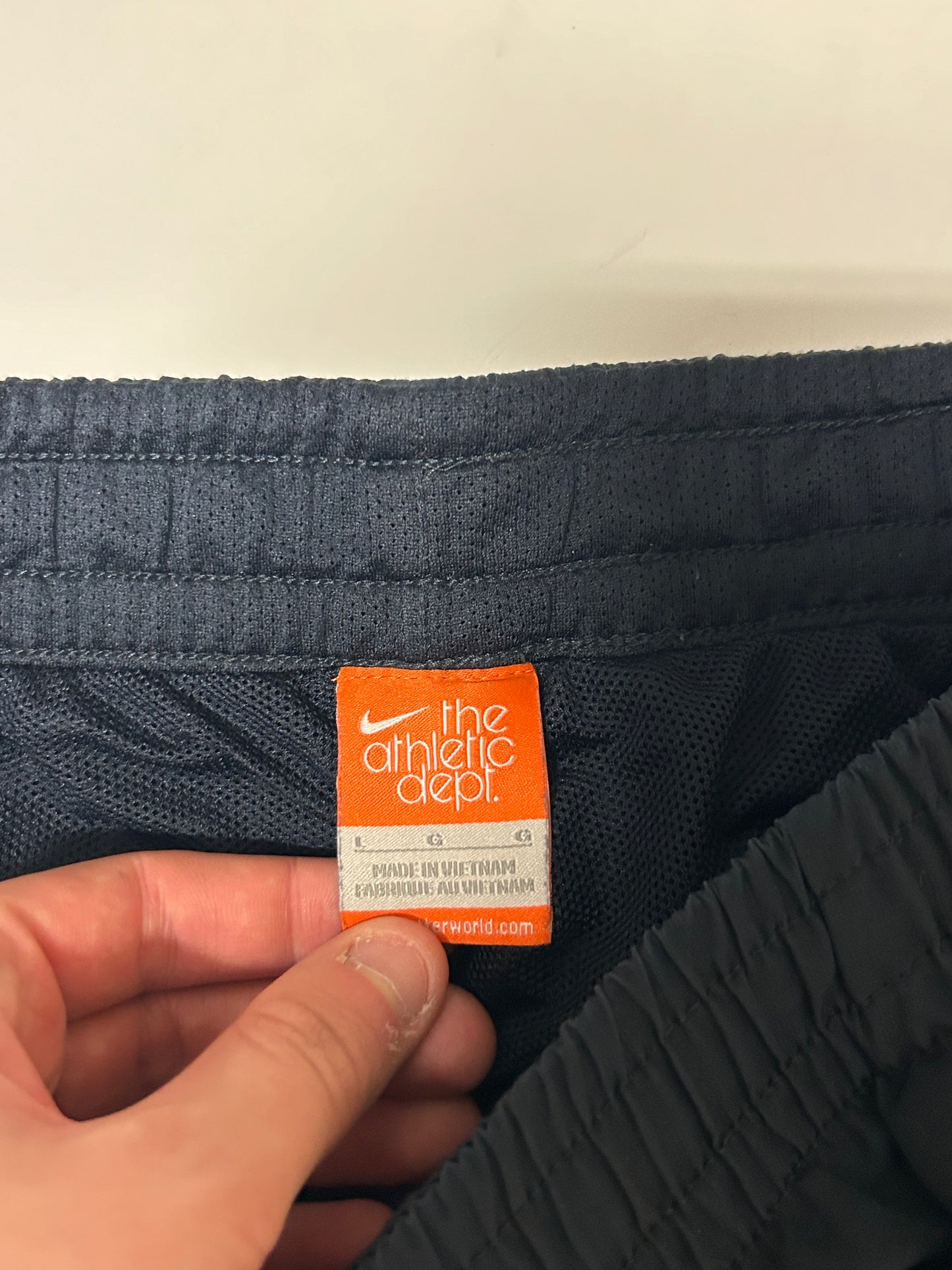 Vintage Nike athletic dept track pants (L)