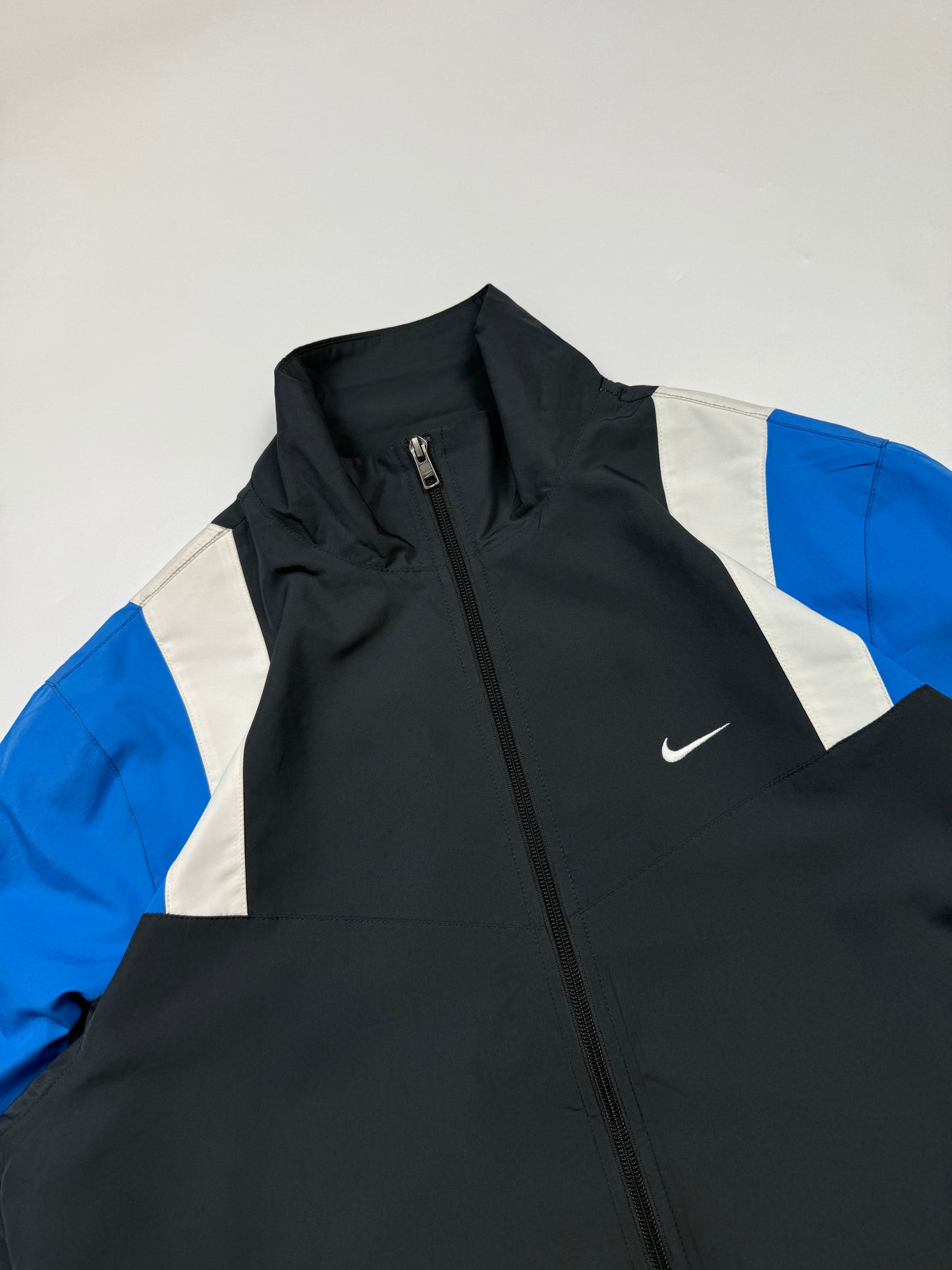 Nike mini swoosh track jacket (M)