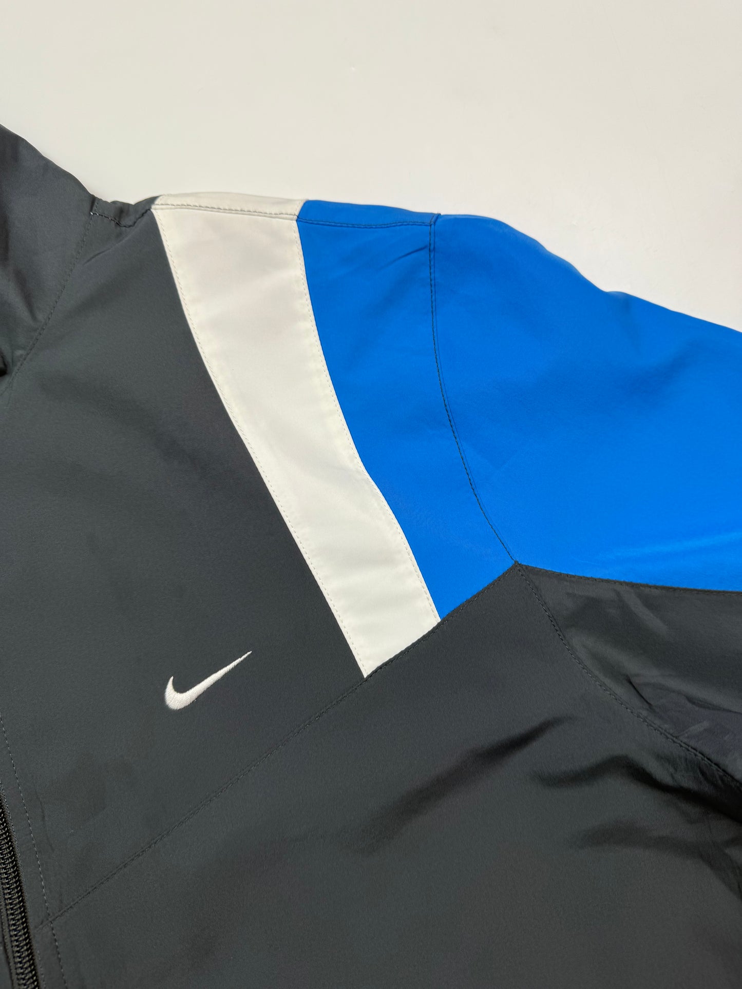 Nike mini swoosh track jacket (M)