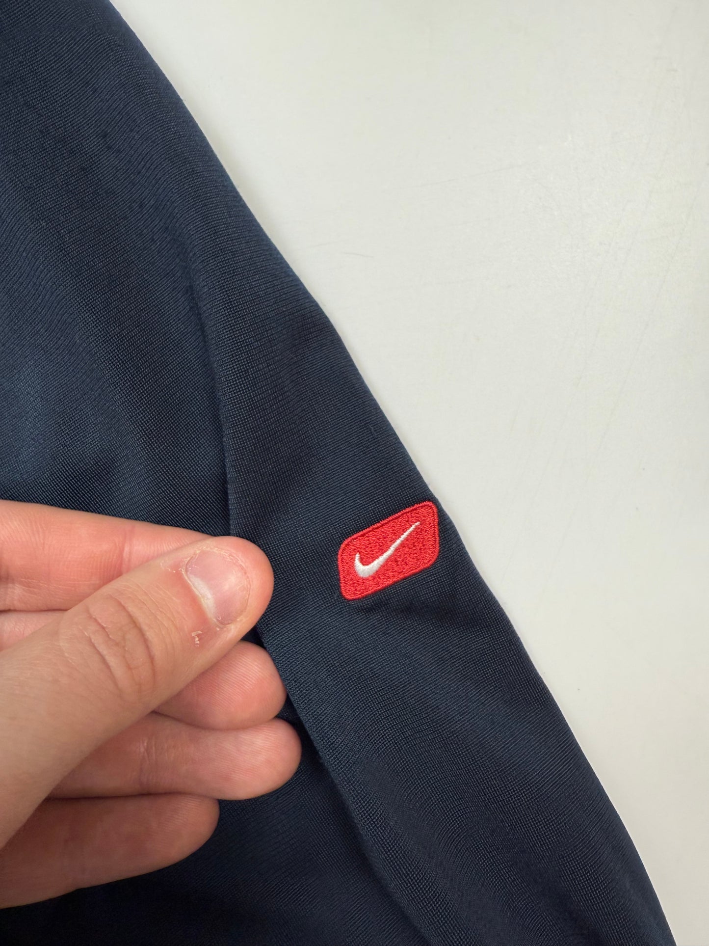 Vintage Nike athletic spell out track jacket (M)
