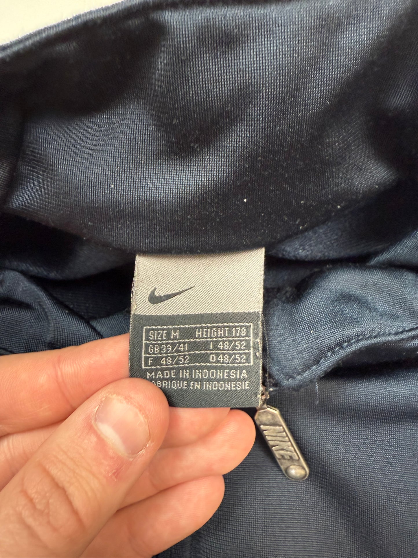 Vintage Nike athletic spell out track jacket (M)
