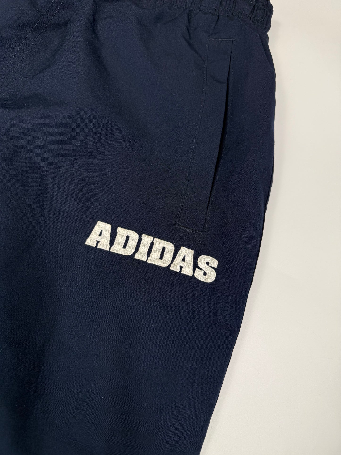 Vintage Adidas spell out baggy track pants (L)