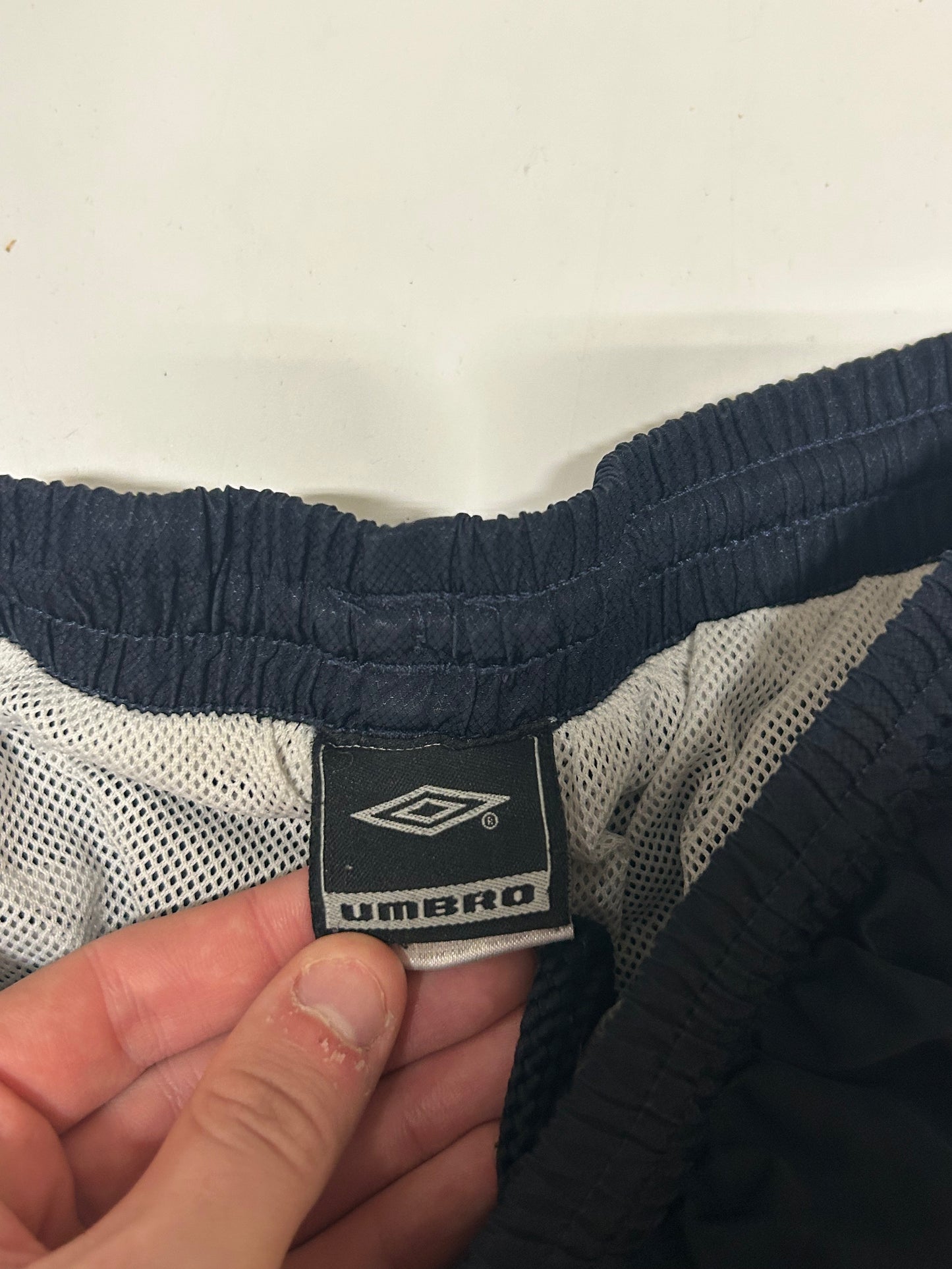 Vintage Umbro spell out track pants (M)