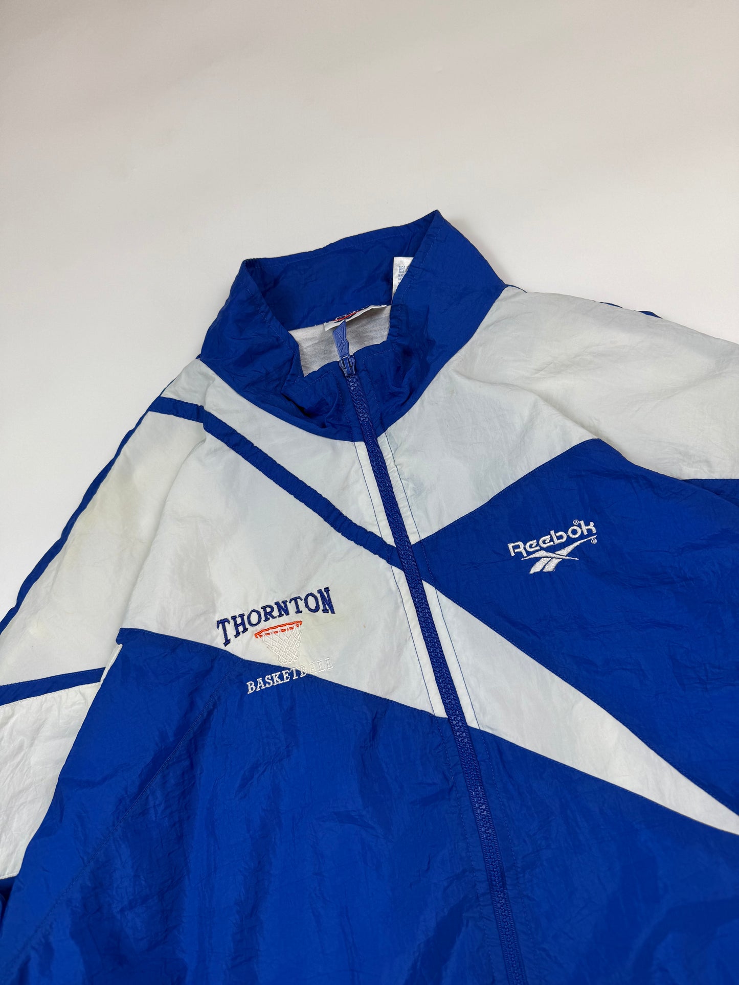 Vintage 90s Reebok abstract colour block shell track jacket (XL)