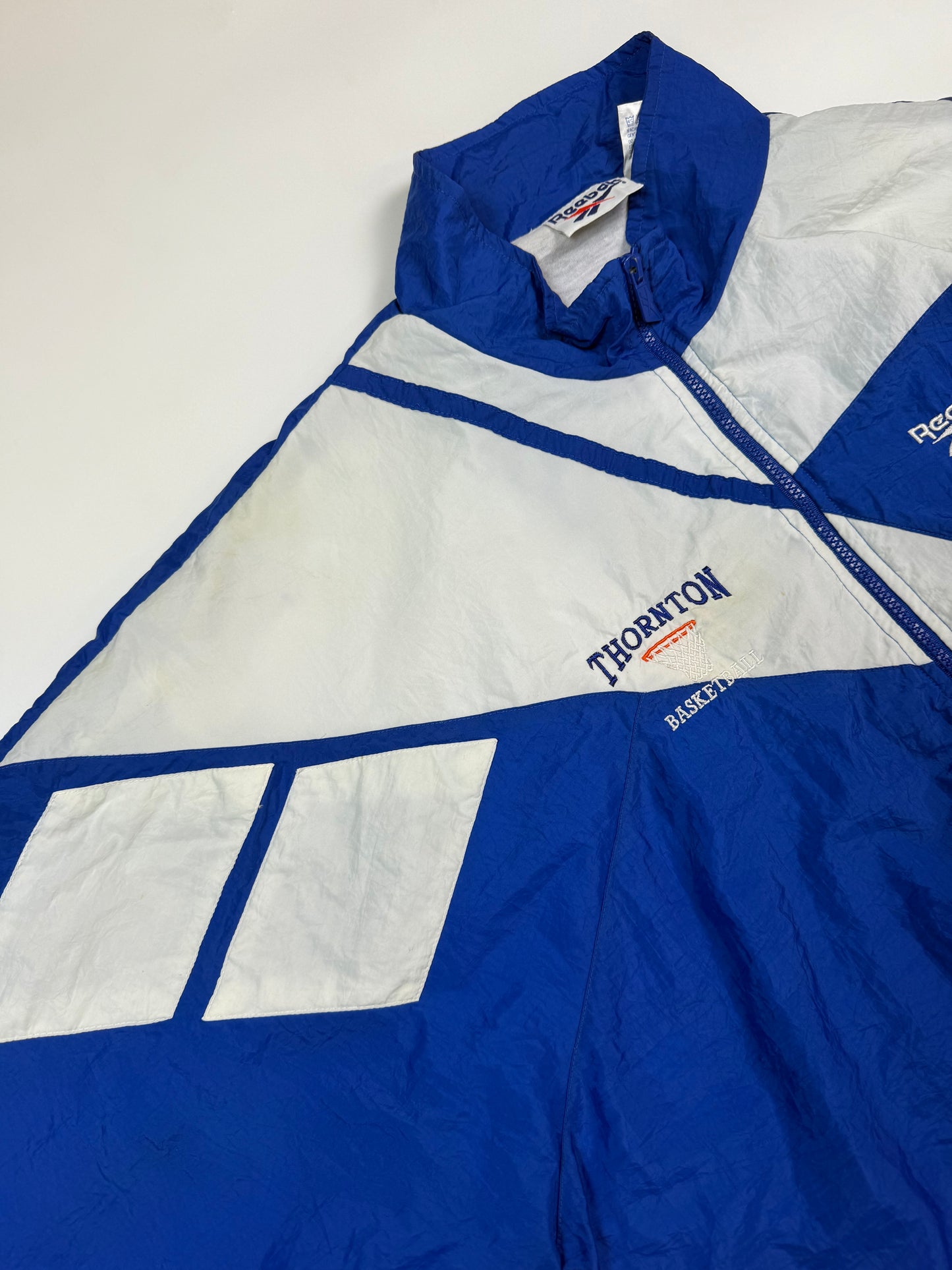 Vintage 90s Reebok abstract colour block shell track jacket (XL)