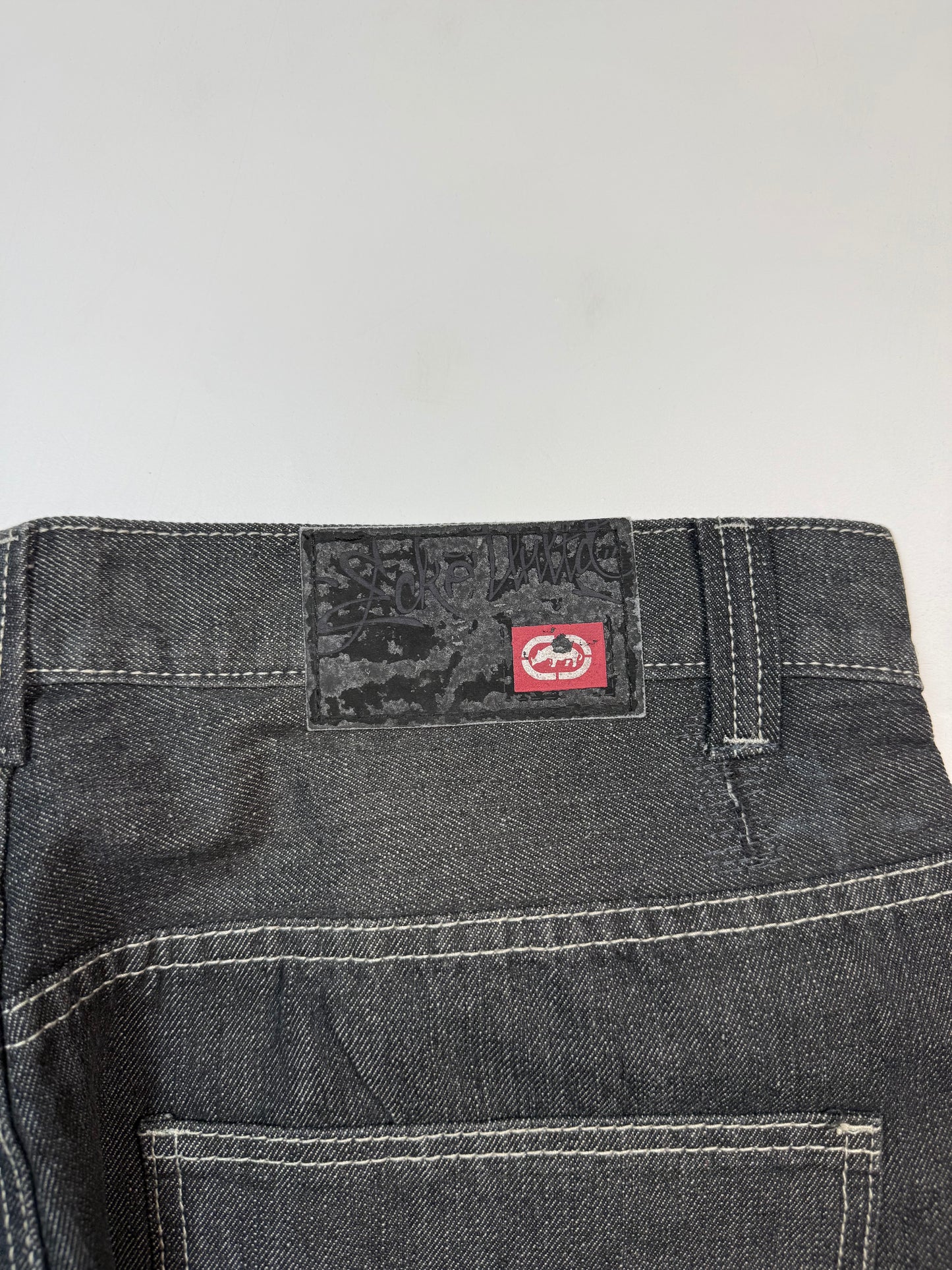 Vintage Ecko Unltd spell out baggy jeans (W38)