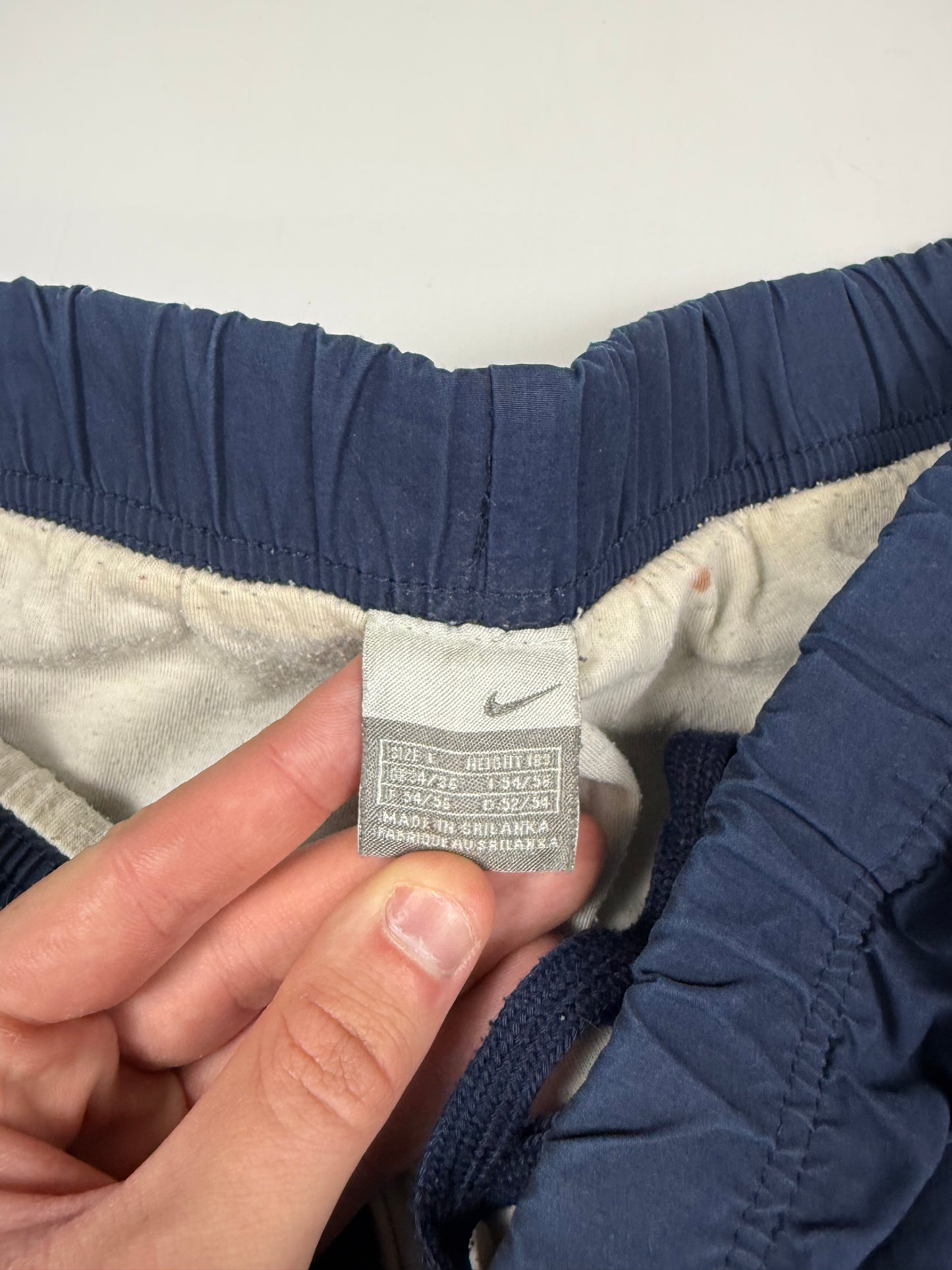Vintage Nike mini swoosh baggy track pants (L)