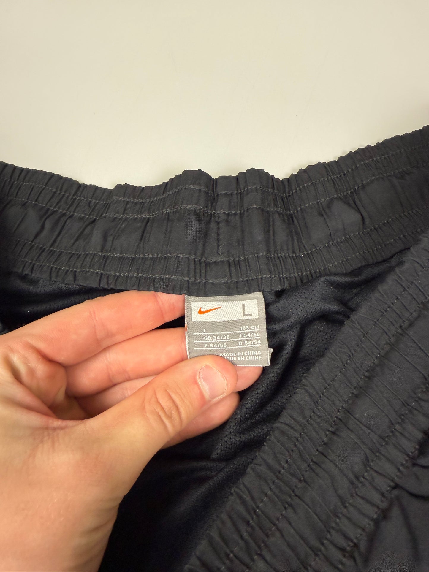 Vintage Nike side stripe baggy track pants (L)
