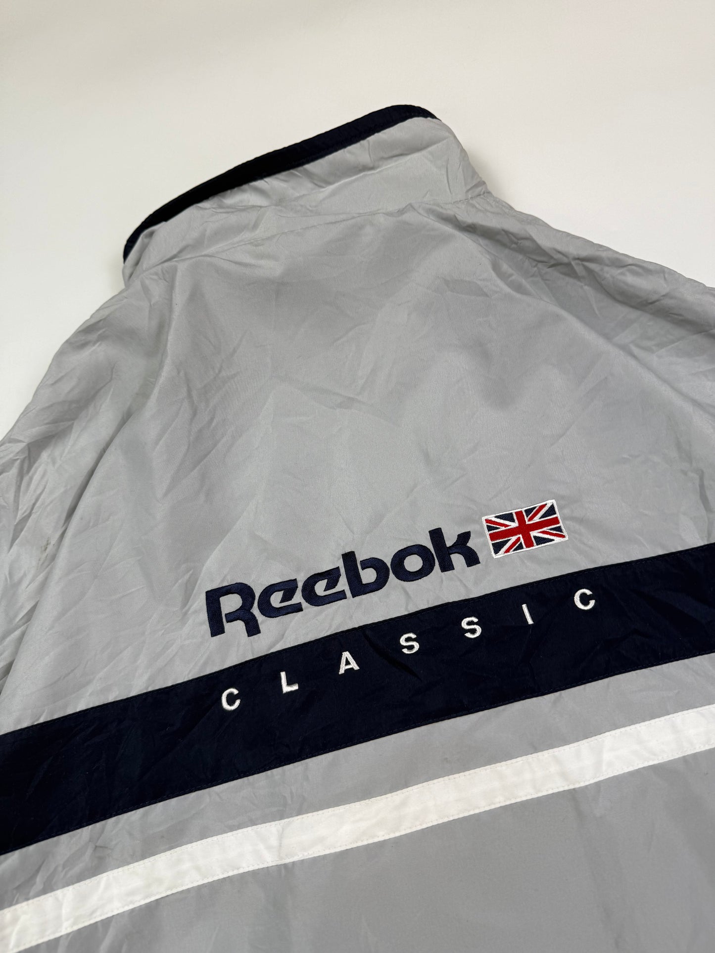 Vintage Reebok classic spell out track jacket (L)
