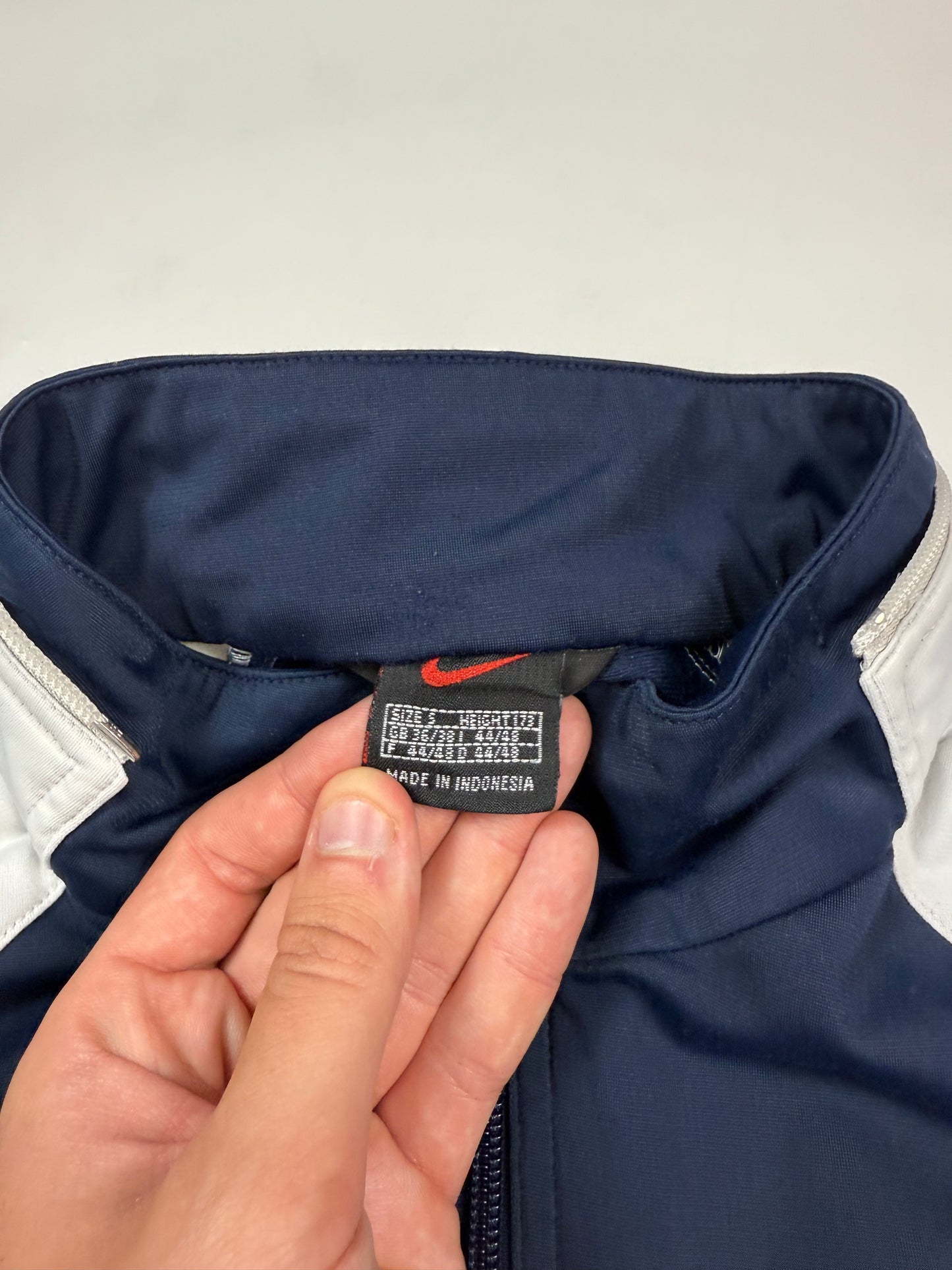 Vintage 90s Nike spell out track jacket (S)