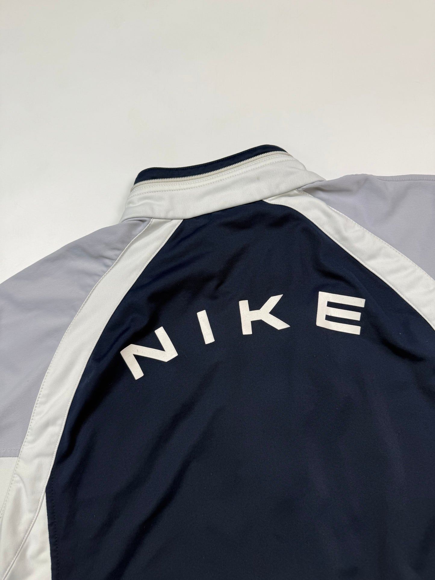 Vintage 90s Nike spell out track jacket (S)