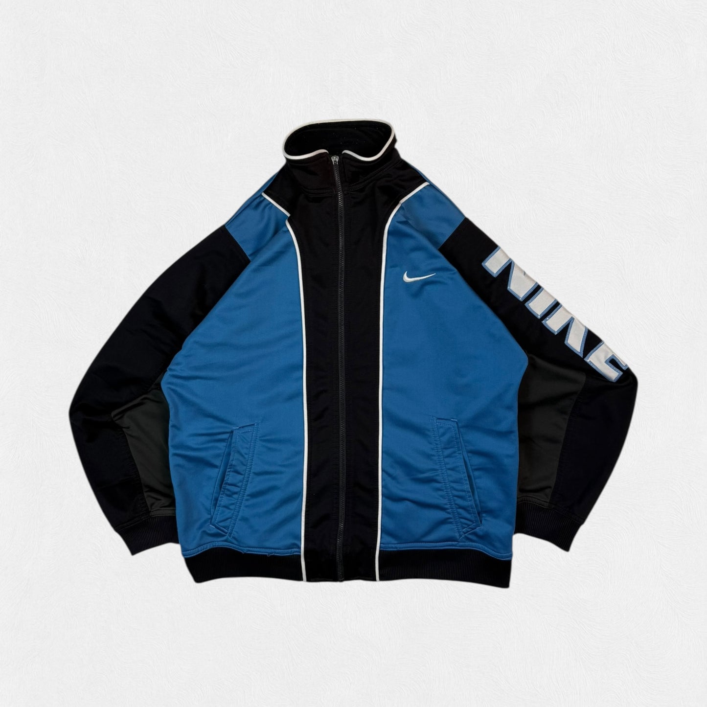 Vintage 90s Nike spell out track jacket (S)