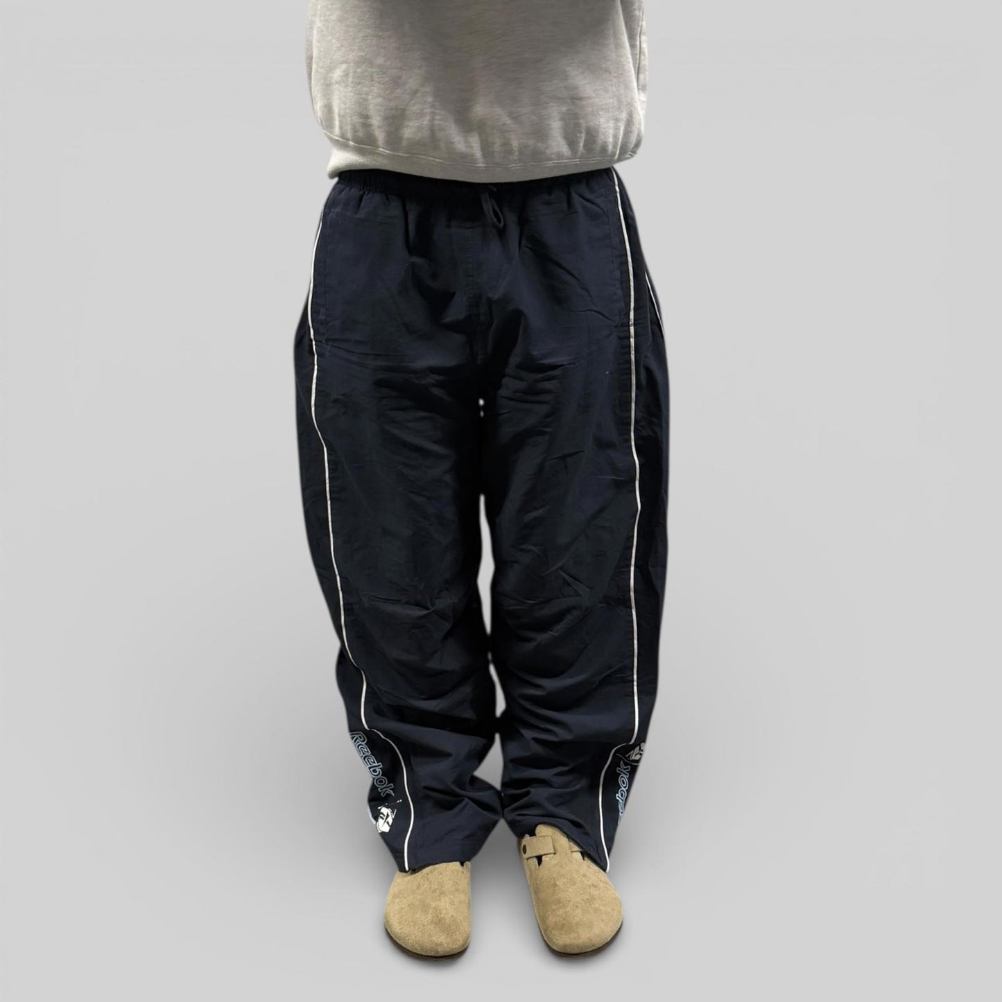 Vintage Reebok spell out baggy track pants (XL)