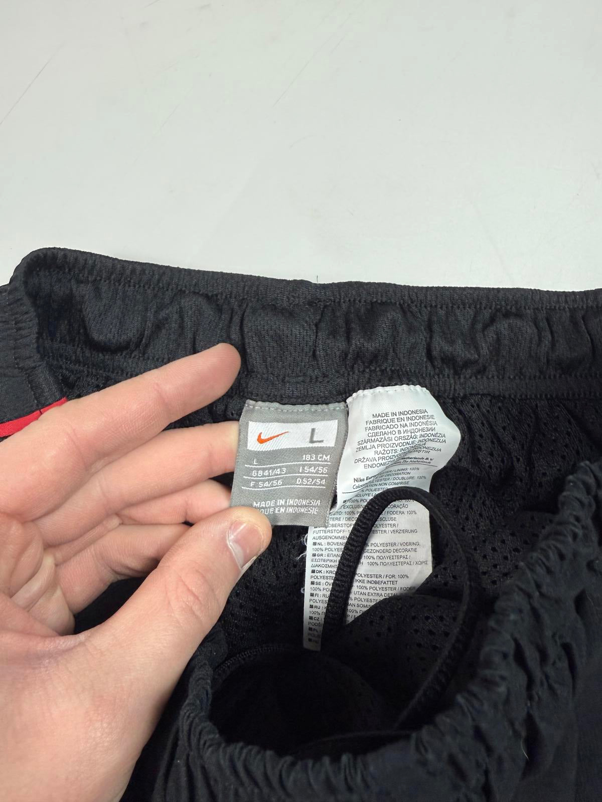 Vintage Nike side stripe baggy track pants (L)