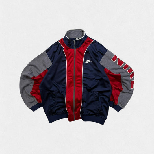 Vintage 90s Nike spell out track jacket (XL)