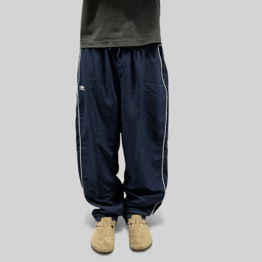Vintage Umbro spell out baggy track pants (XXL)