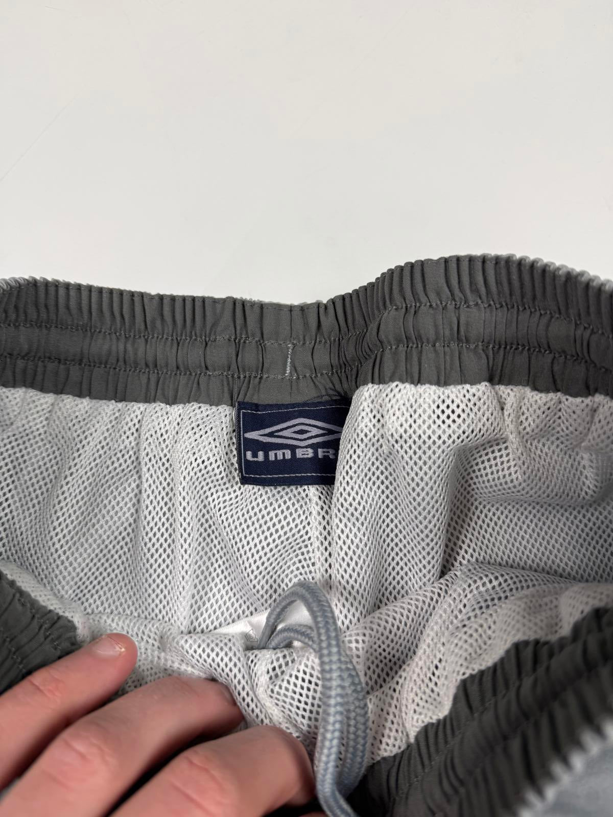 Vintage Umbro spell out baggy track pants (S)