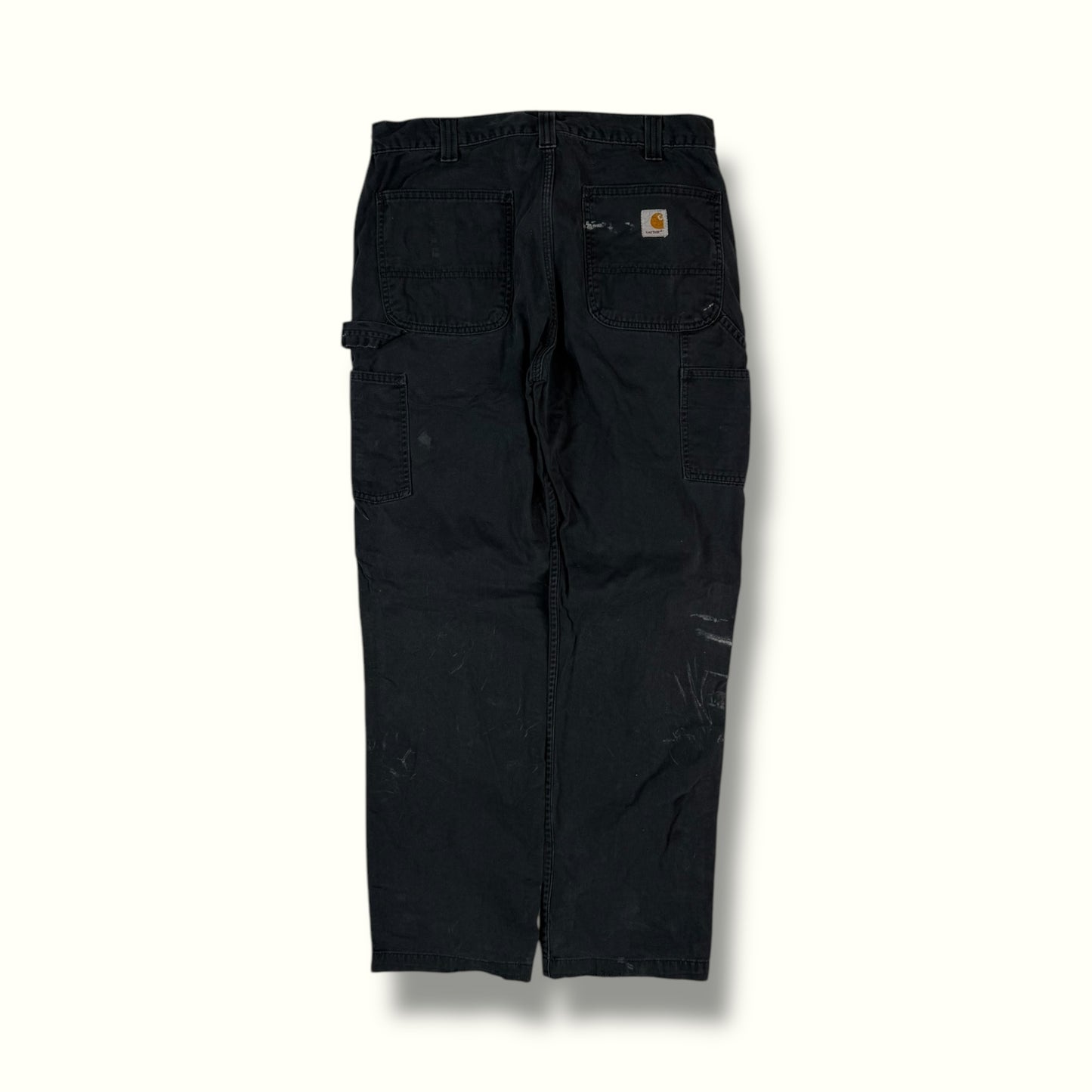 Black Carhartt carpenter pants baggy fit paint splatters