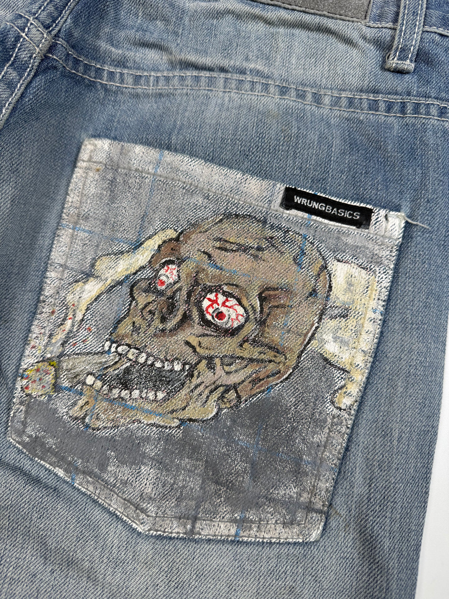 Vintage Y2K Skull logo denim jeans (W30)