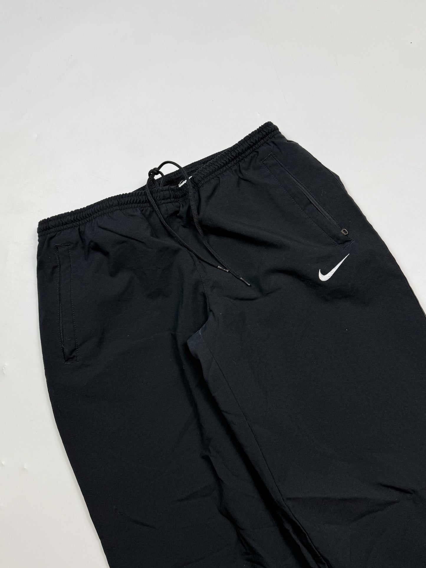 Vintage Nike baggy mini swoosh track pants (M)