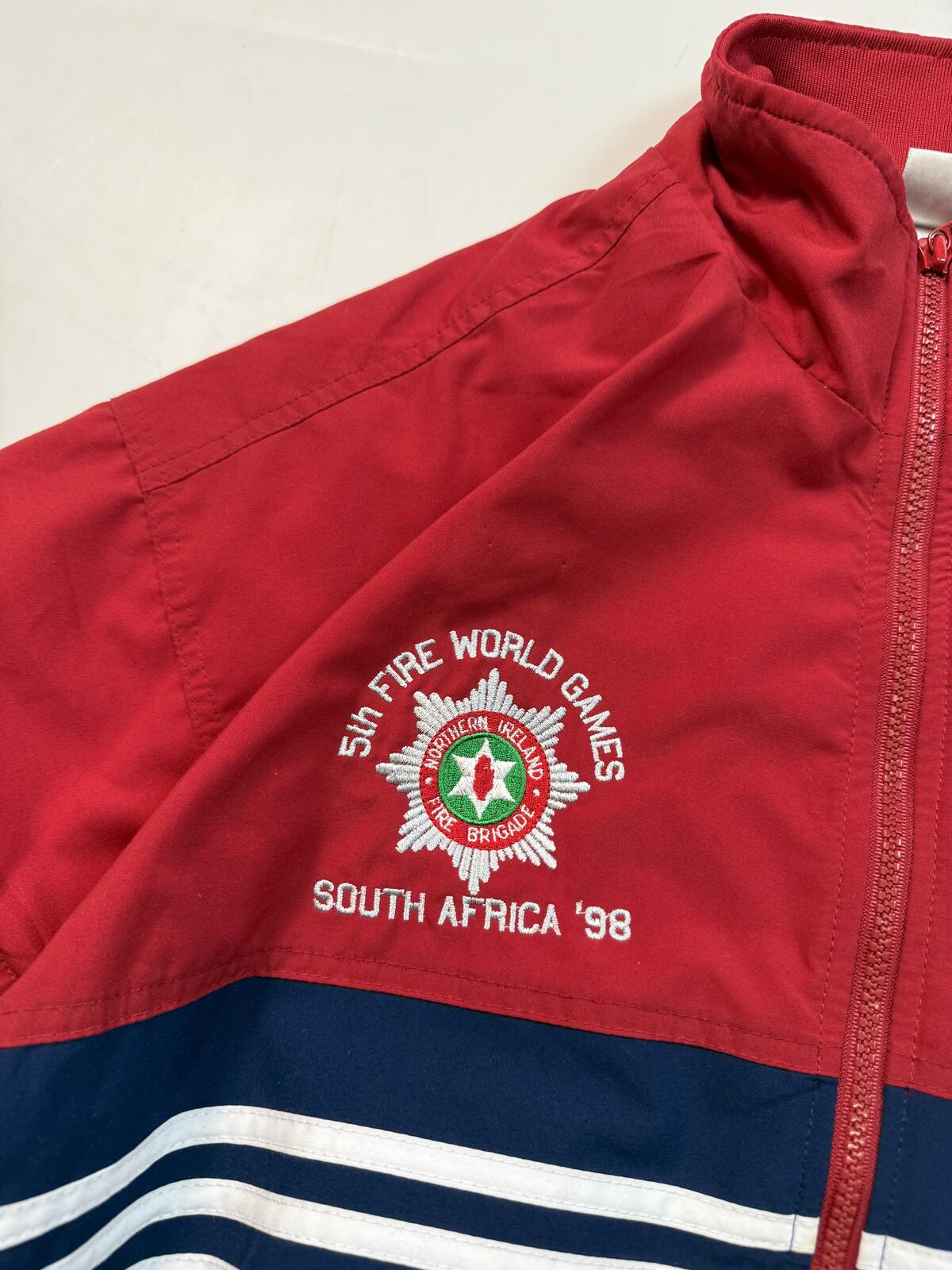 Vintage 90s Adidas fire world games Track jacket (M)