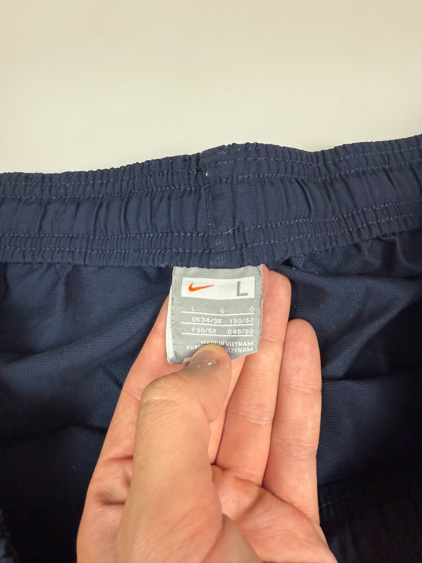 Vintage Nike mini swoosh baggy track pants (L)