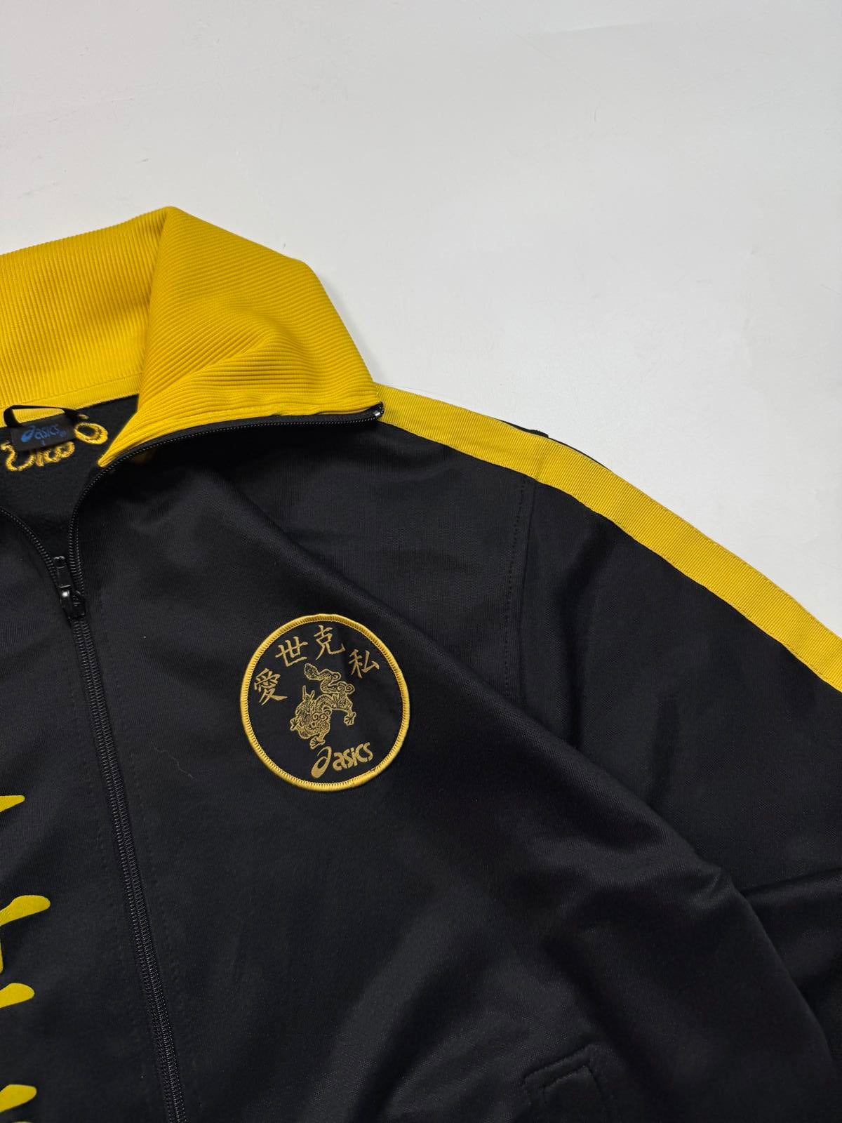 Vintage Asics track top (L)