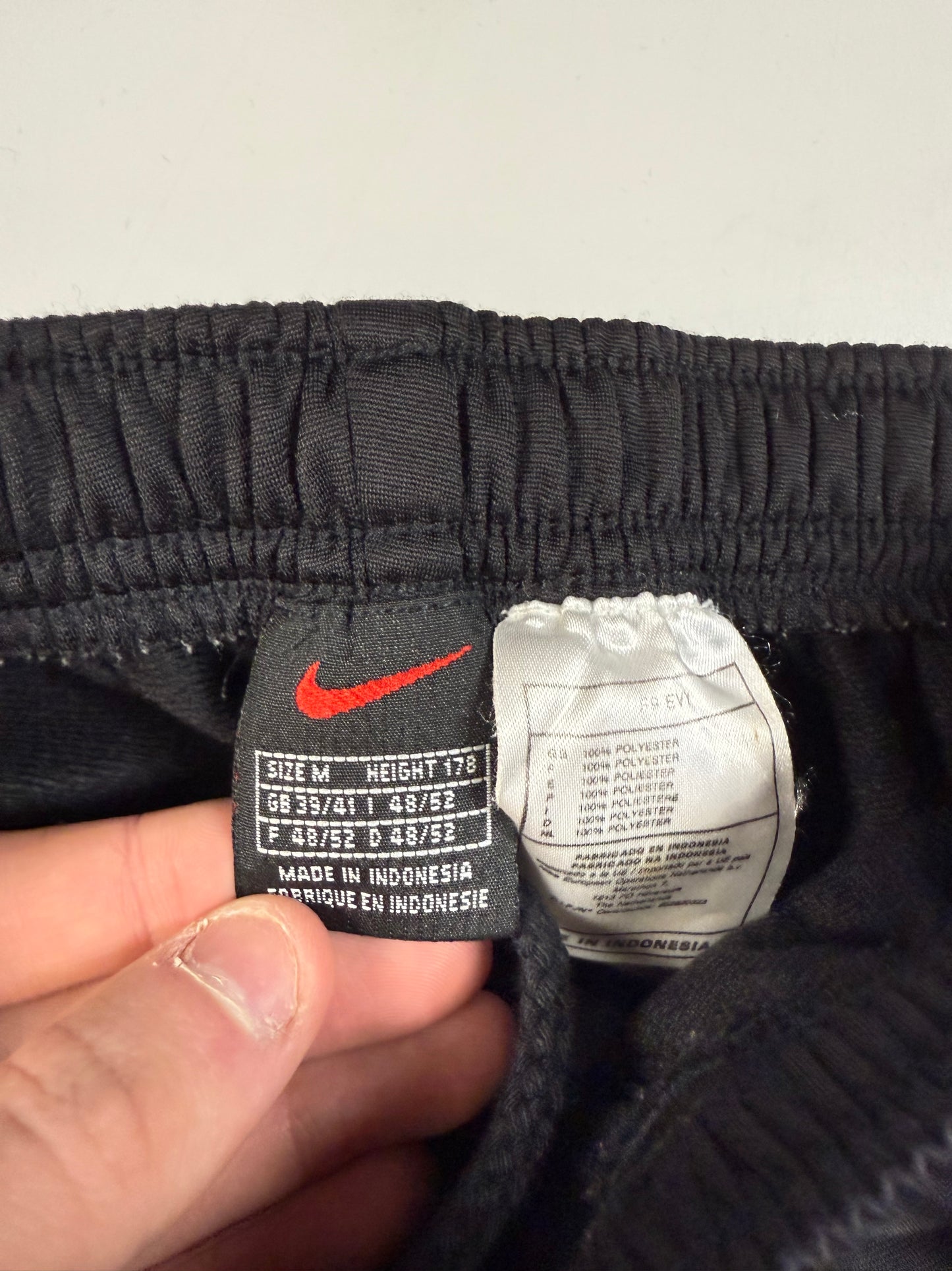 Vintage 90s Nike popper track pants (M)